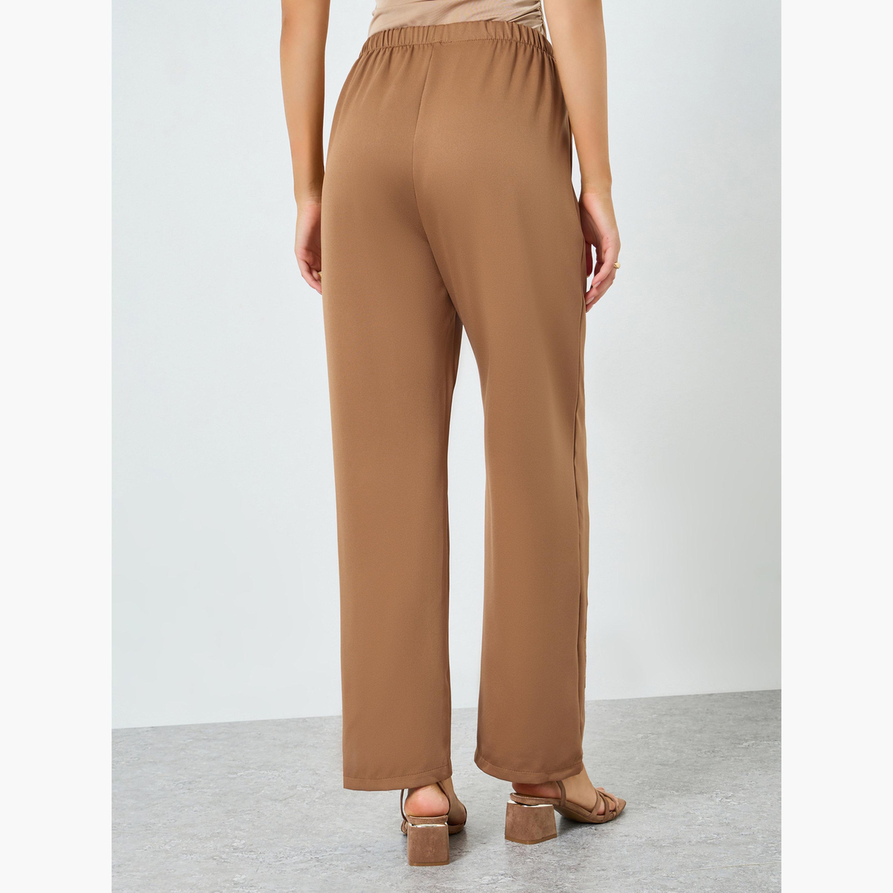 بنطال بأرجل واسعة وتفاصيل مُطرّزة-women-clothing-bottoms-trousers-image-4