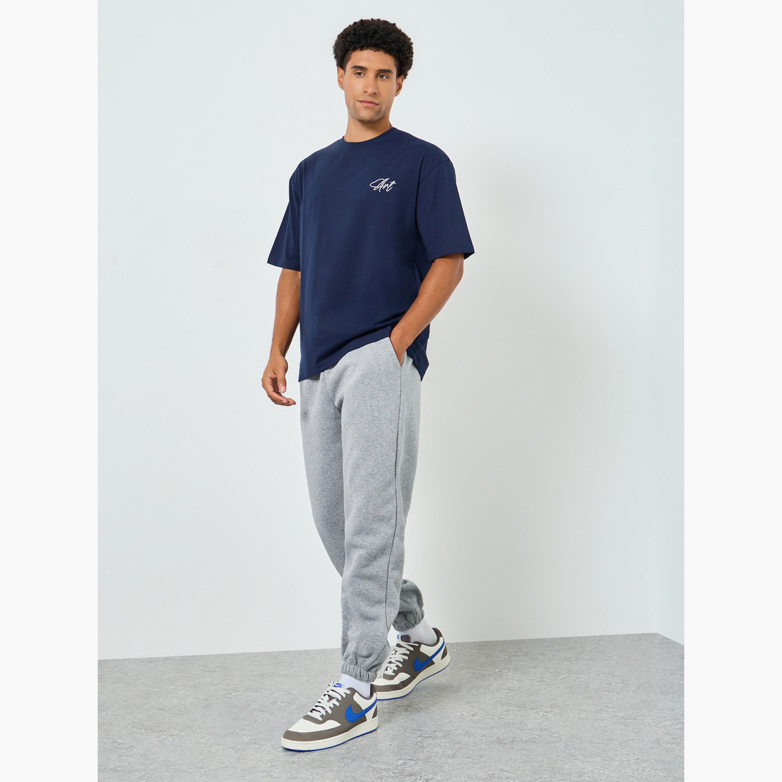 بنطال سادة بتفاصيل جيوب ورباط خصر للرجال-men-clothing-bottoms-trousersandchinos-trousers-image-2