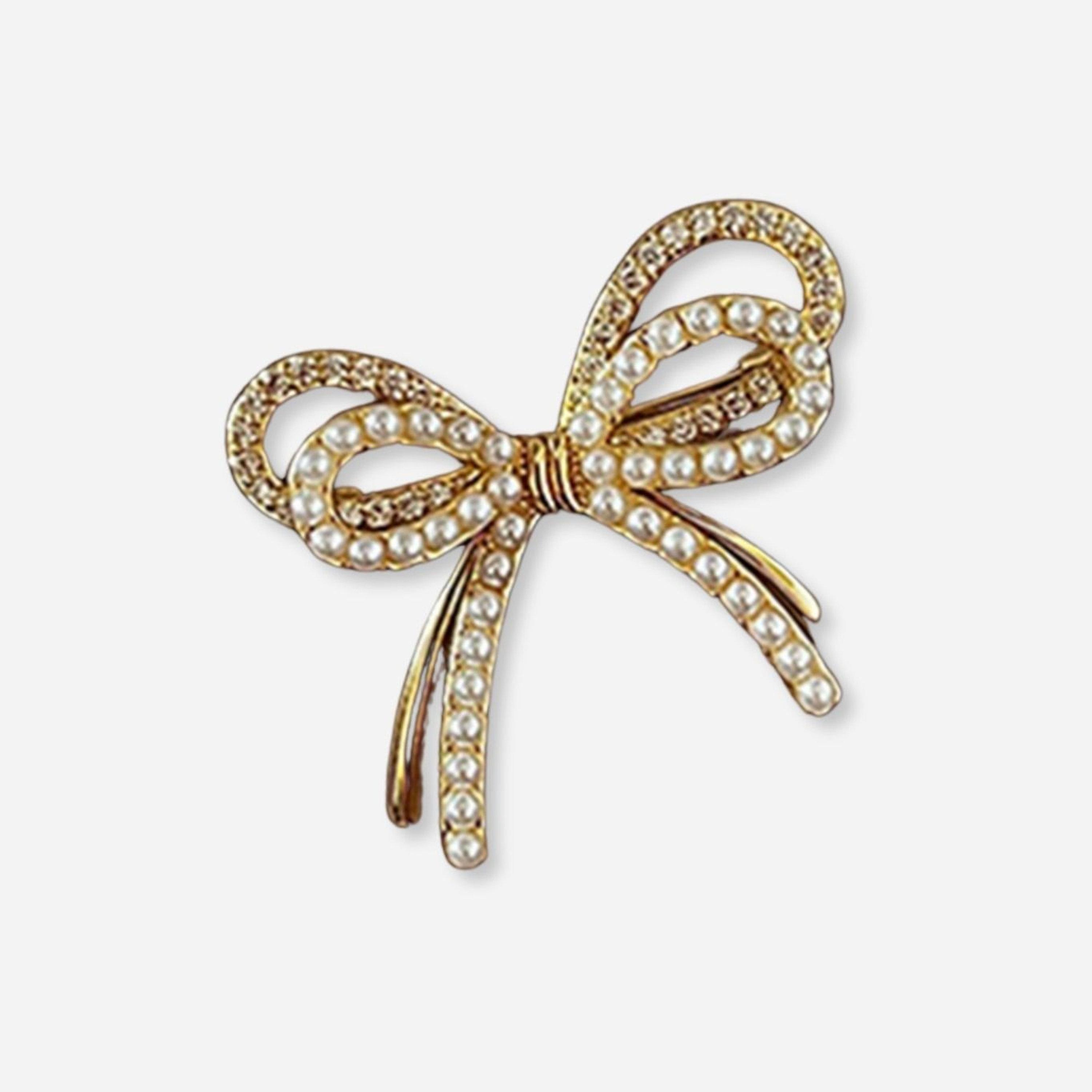 تيك تو - بروش ذهبي على شكل فيونكة مرصع باللؤلؤ-women-watchesandjewellery-jewellery-brooches-image-1