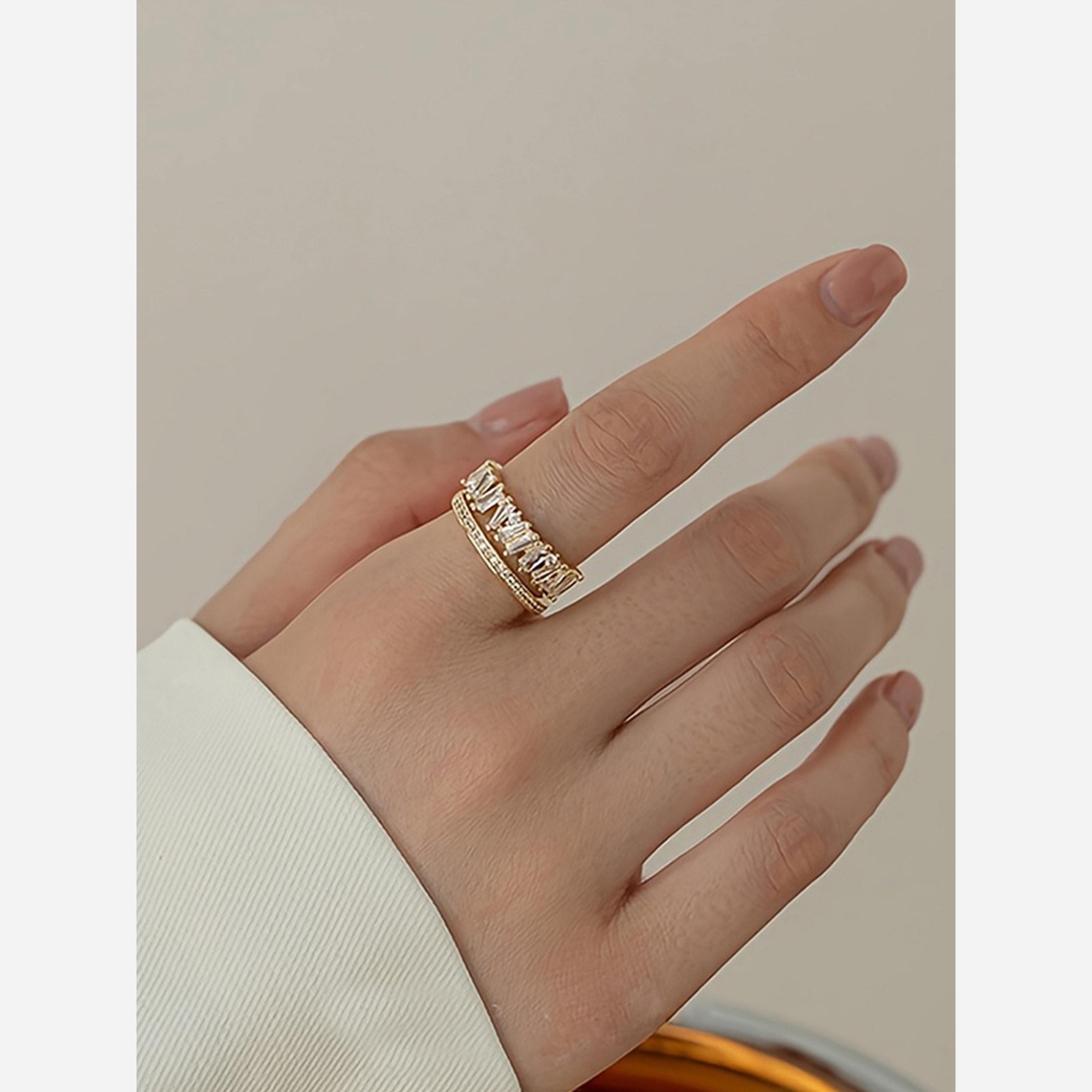 تيك تو - خاتم ذهبي مفتوح مزين بأحجار كريستال على شكل باغيت-women-watchesandjewellery-jewellery-rings-image-2
