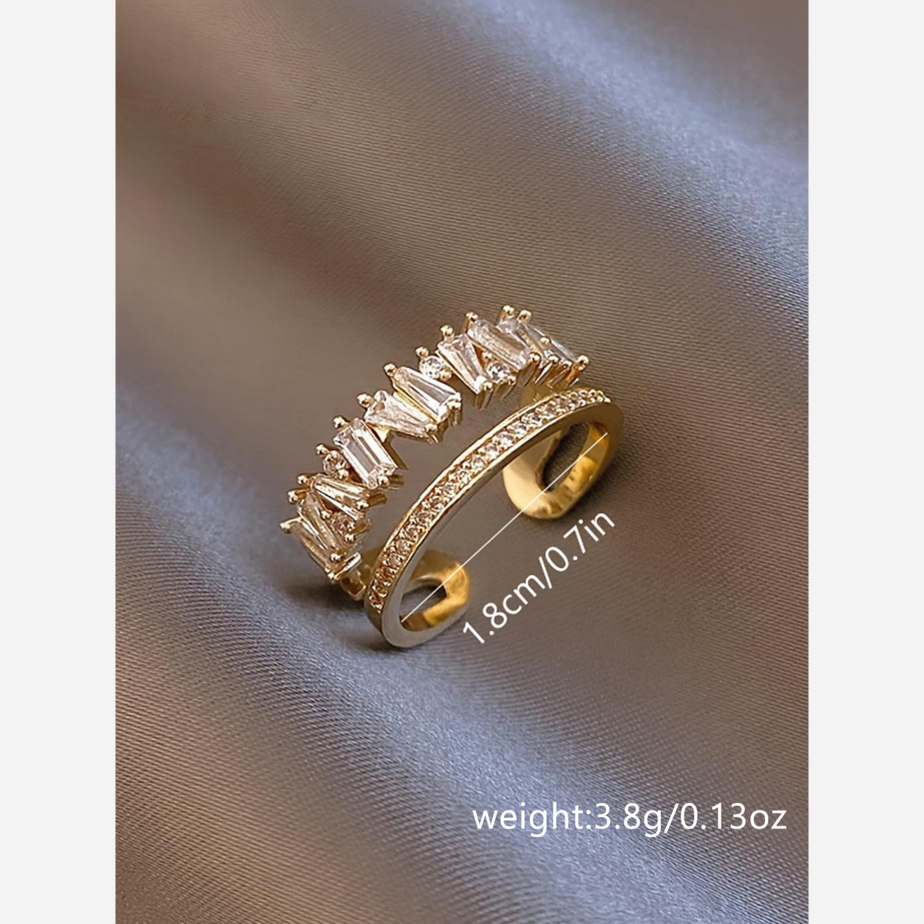 تيك تو - خاتم ذهبي مفتوح مزين بأحجار كريستال على شكل باغيت-women-watchesandjewellery-jewellery-rings-image-3