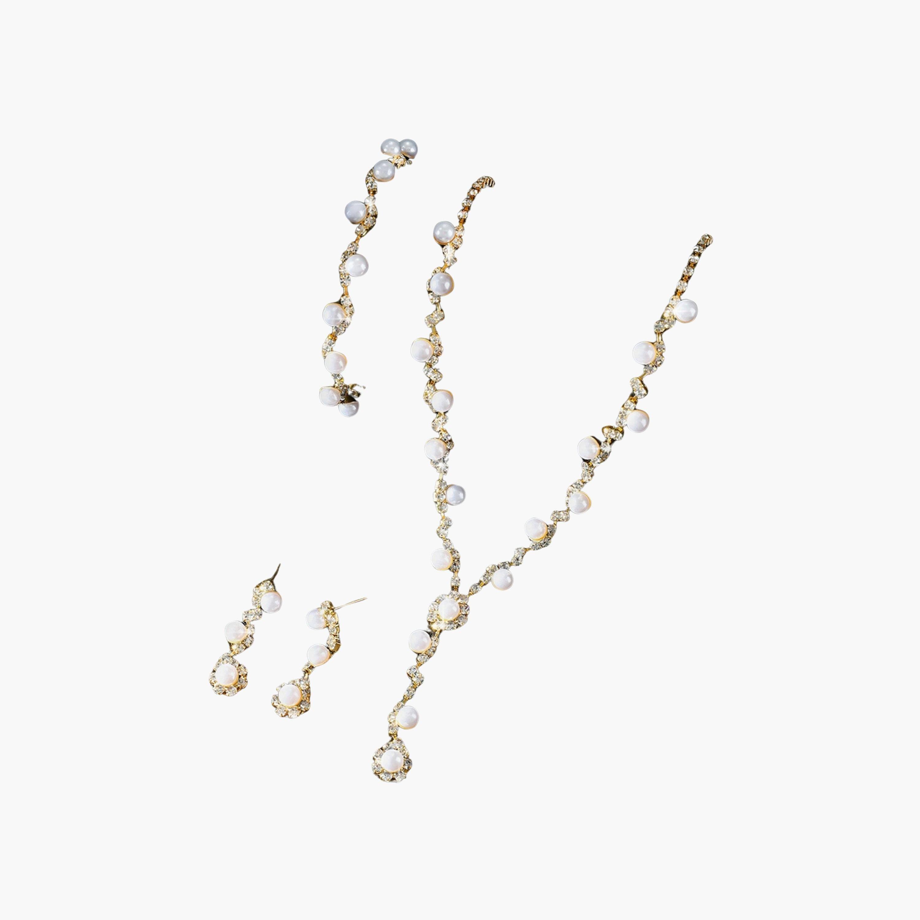 تيك تو - طقم عقد من اللؤلؤ الذهبي مع سوار وأقراط-women-watchesandjewellery-jewellery-jewellerysets-image-1
