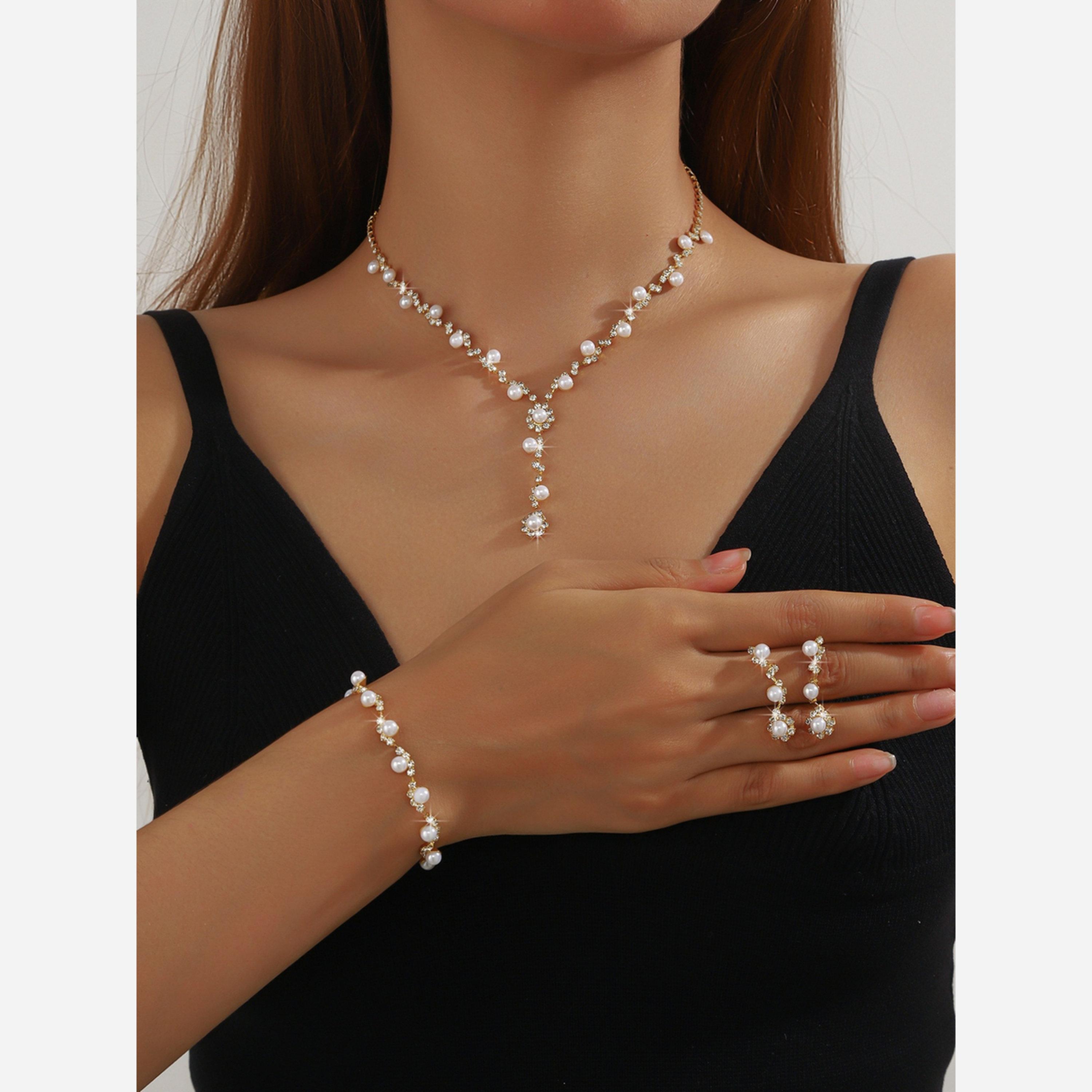تيك تو - طقم عقد من اللؤلؤ الذهبي مع سوار وأقراط-women-watchesandjewellery-jewellery-jewellerysets-image-2