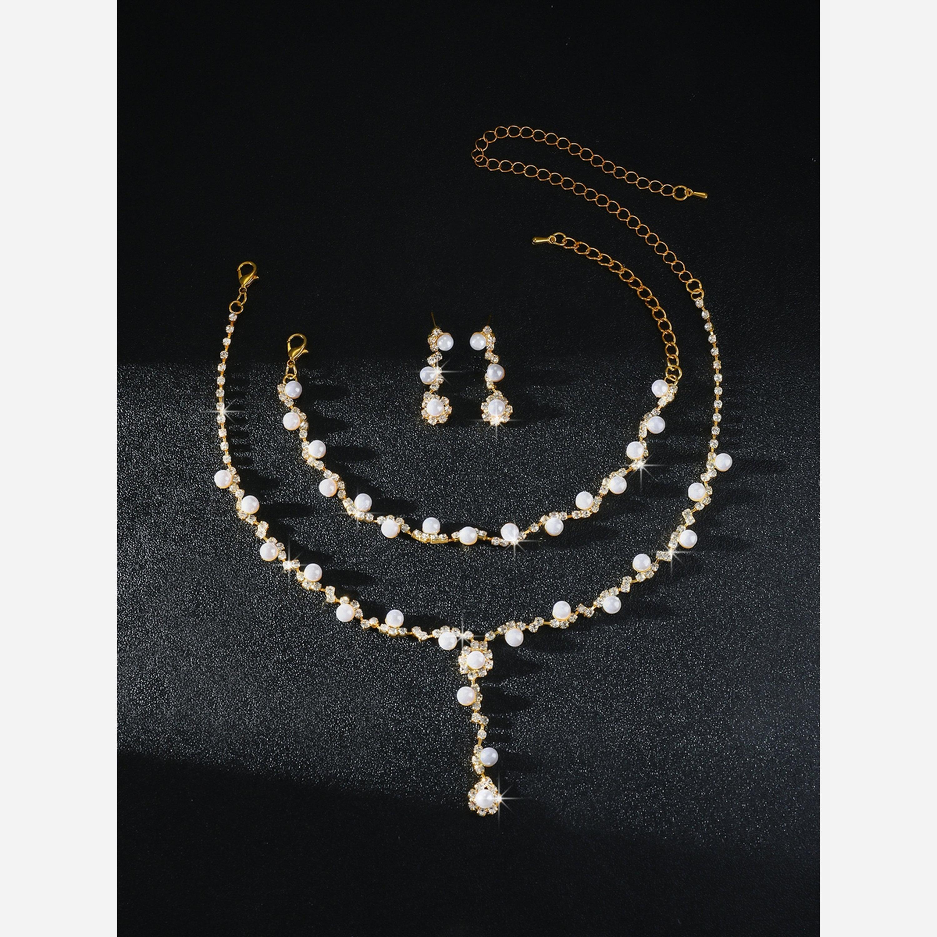 تيك تو - طقم عقد من اللؤلؤ الذهبي مع سوار وأقراط-women-watchesandjewellery-jewellery-jewellerysets-image-6