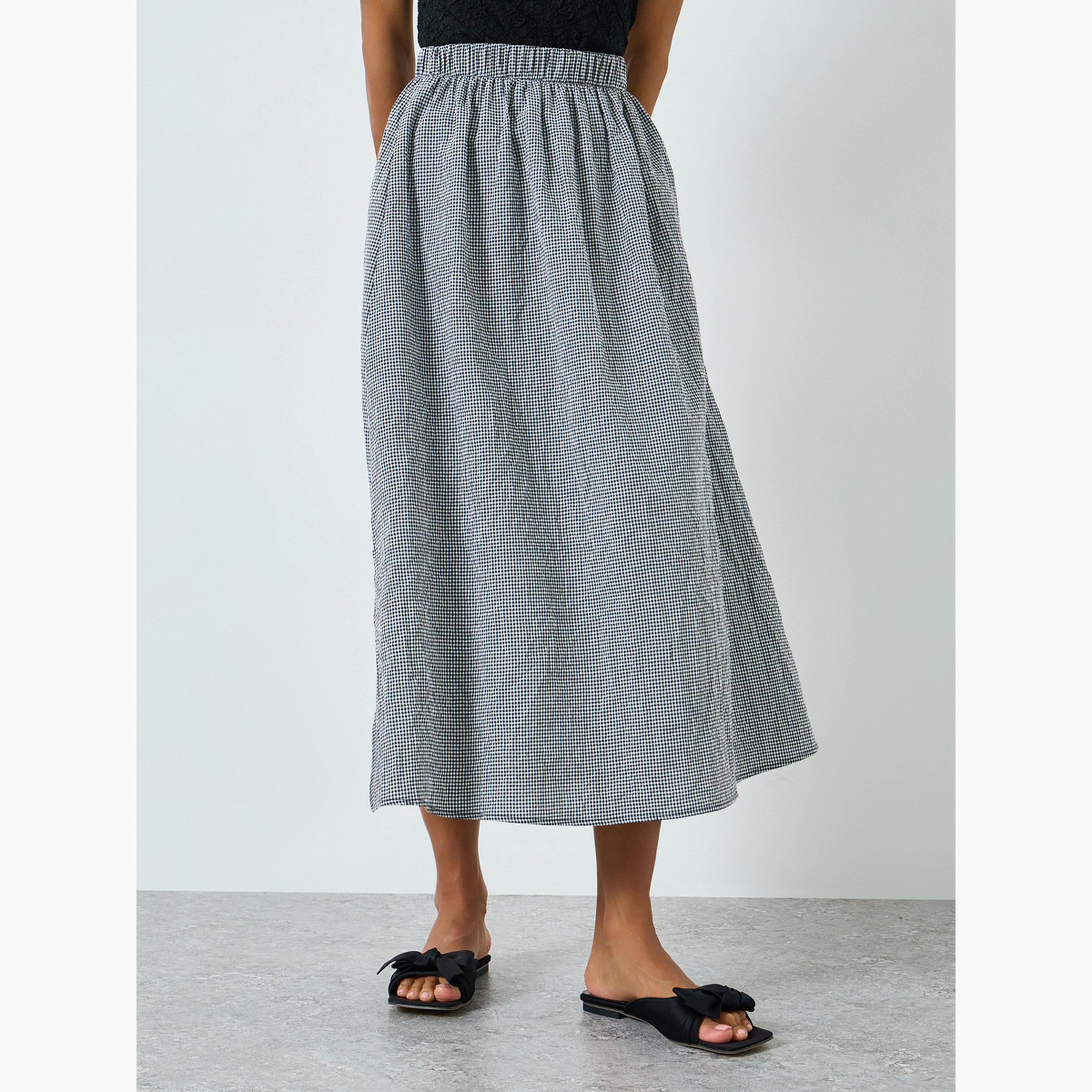 تنورةة بحافة واسعة كاروهات وفتحة جانبية-women-clothing-bottoms-skirts-image-1