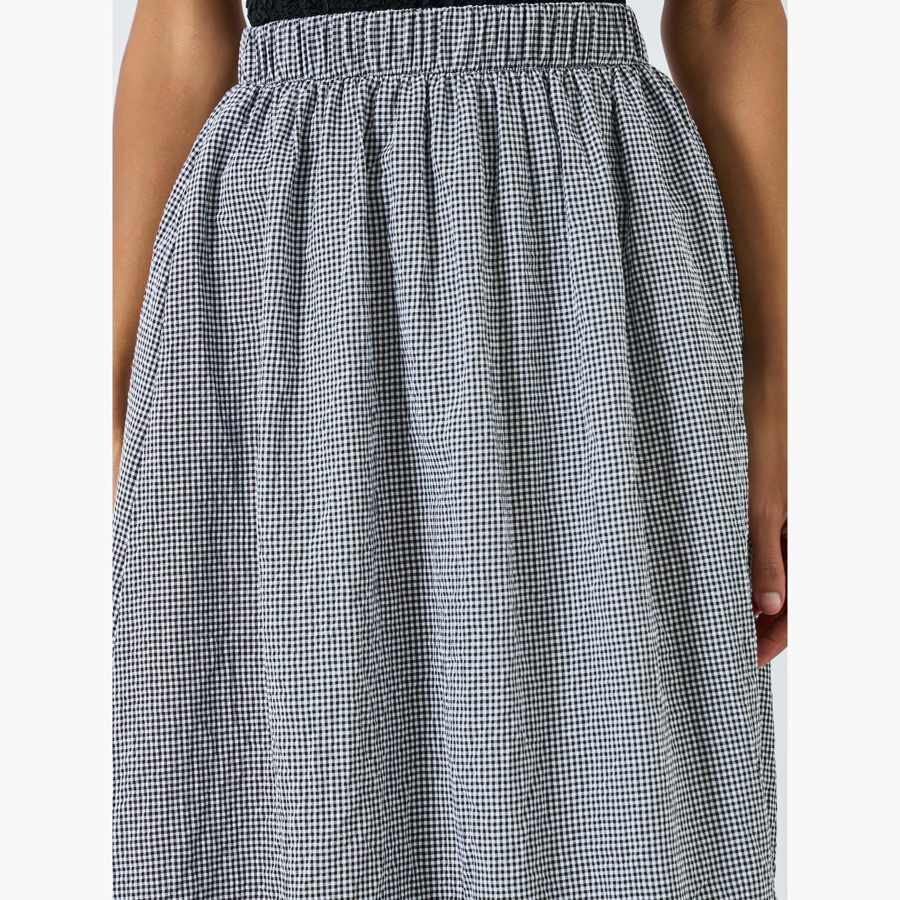 تنورةة بحافة واسعة كاروهات وفتحة جانبية-women-clothing-bottoms-skirts-image-3