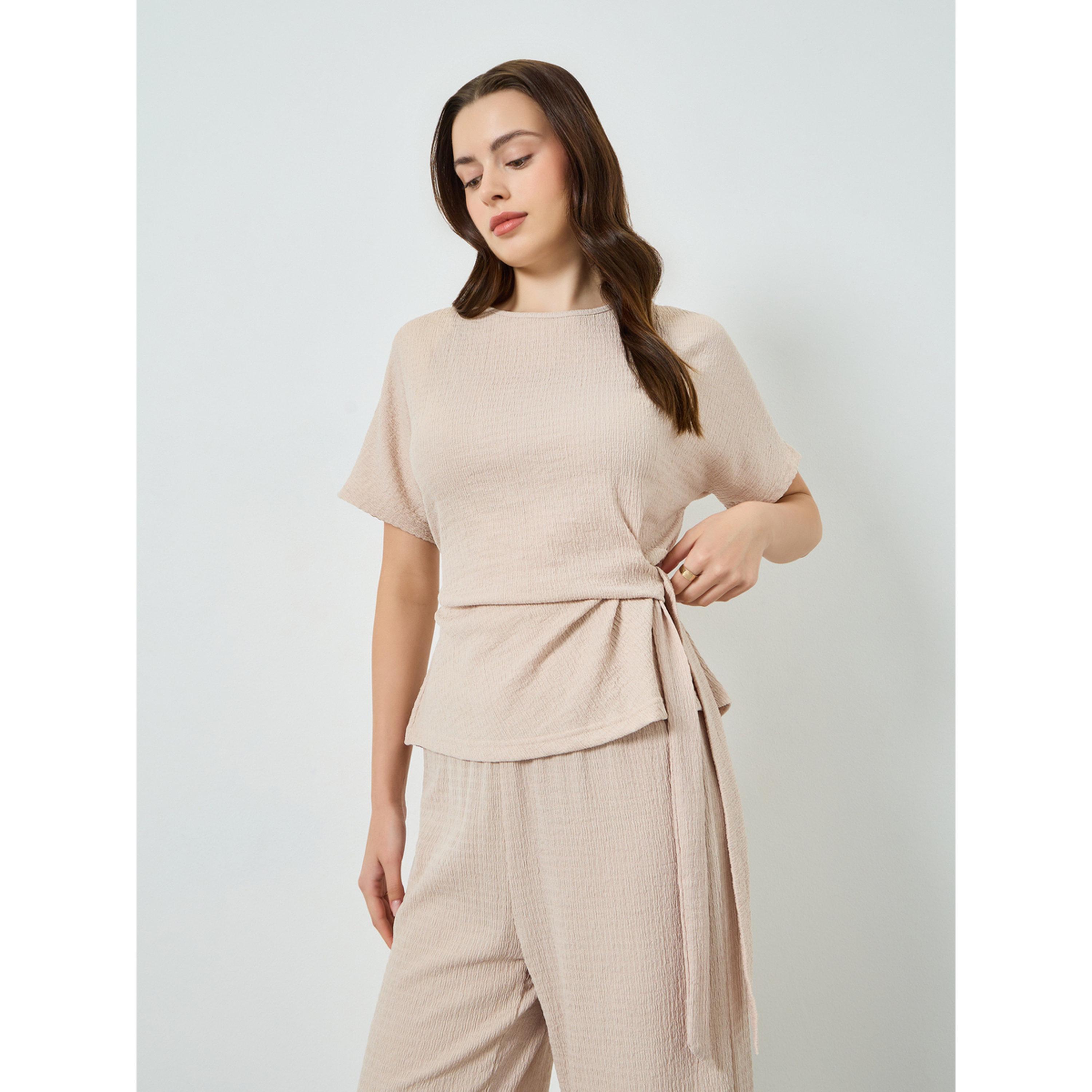 طقم كريمي بلوزة بملمس بارز وبنطال أرجل واسعة-women-clothing-coordsets-image-2