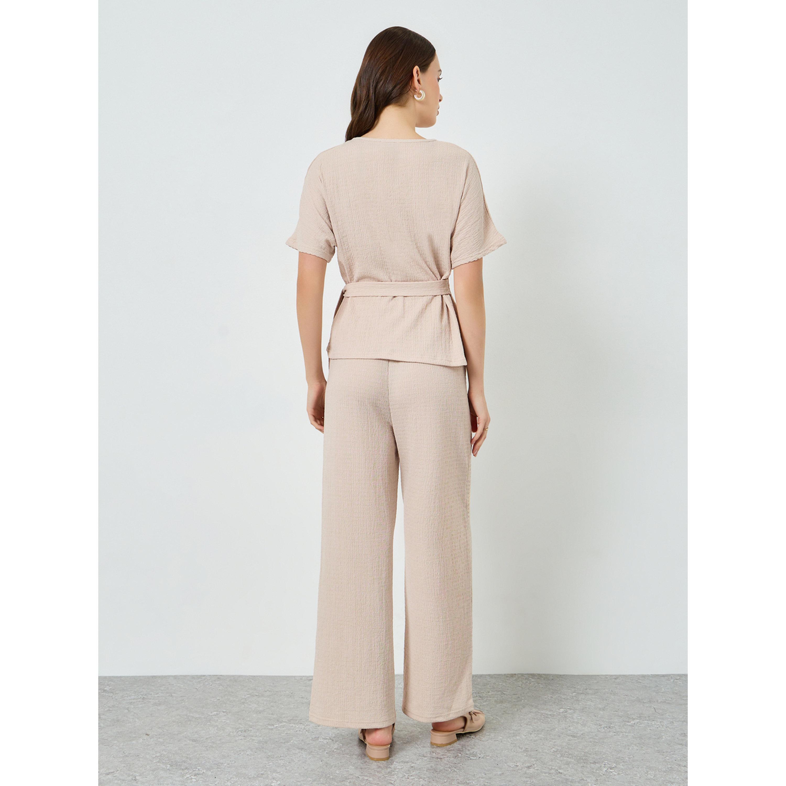 طقم كريمي بلوزة بملمس بارز وبنطال أرجل واسعة-women-clothing-coordsets-image-5