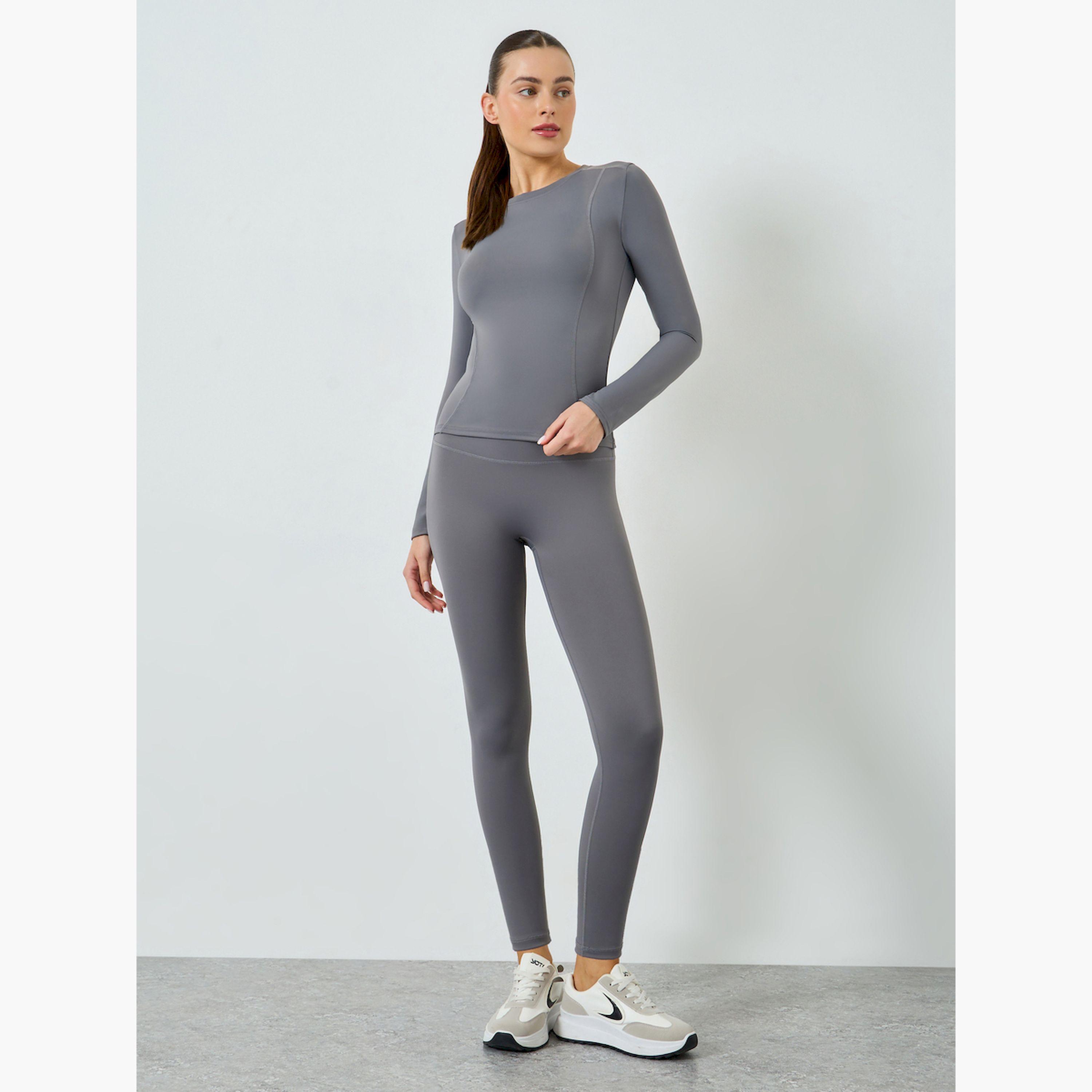 مجموعة من ليقنز وبلوزة بأكمام طويلة وتفاصيل درزات-women-clothing-sportswearandactivewear-trackpantsandtracksuits-image-1