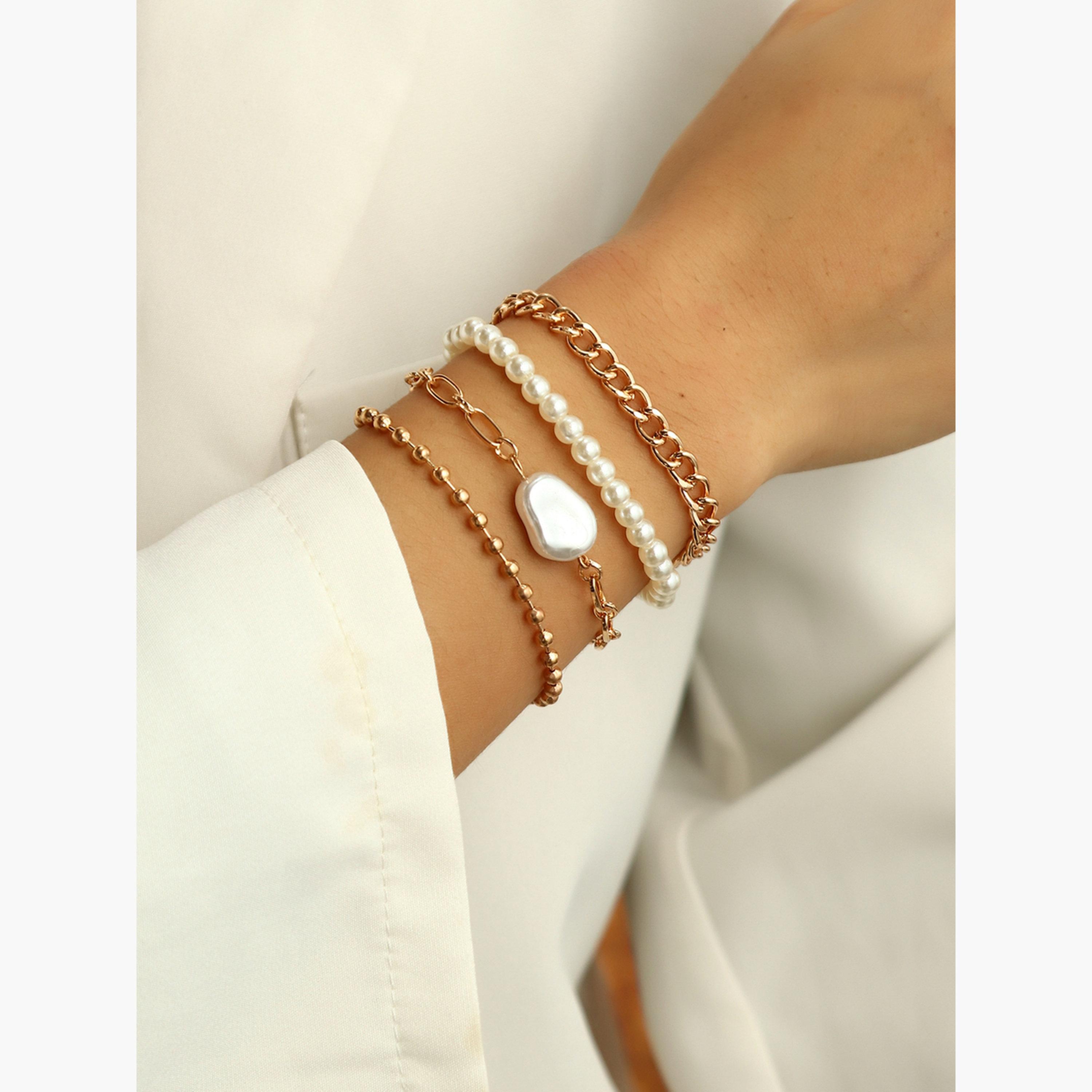 مجموعة من 4 أساور يد مزينة بالخرز واللؤلؤ الصناعي-women-watchesandjewellery-jewellery-banglesandbracelets-image-2