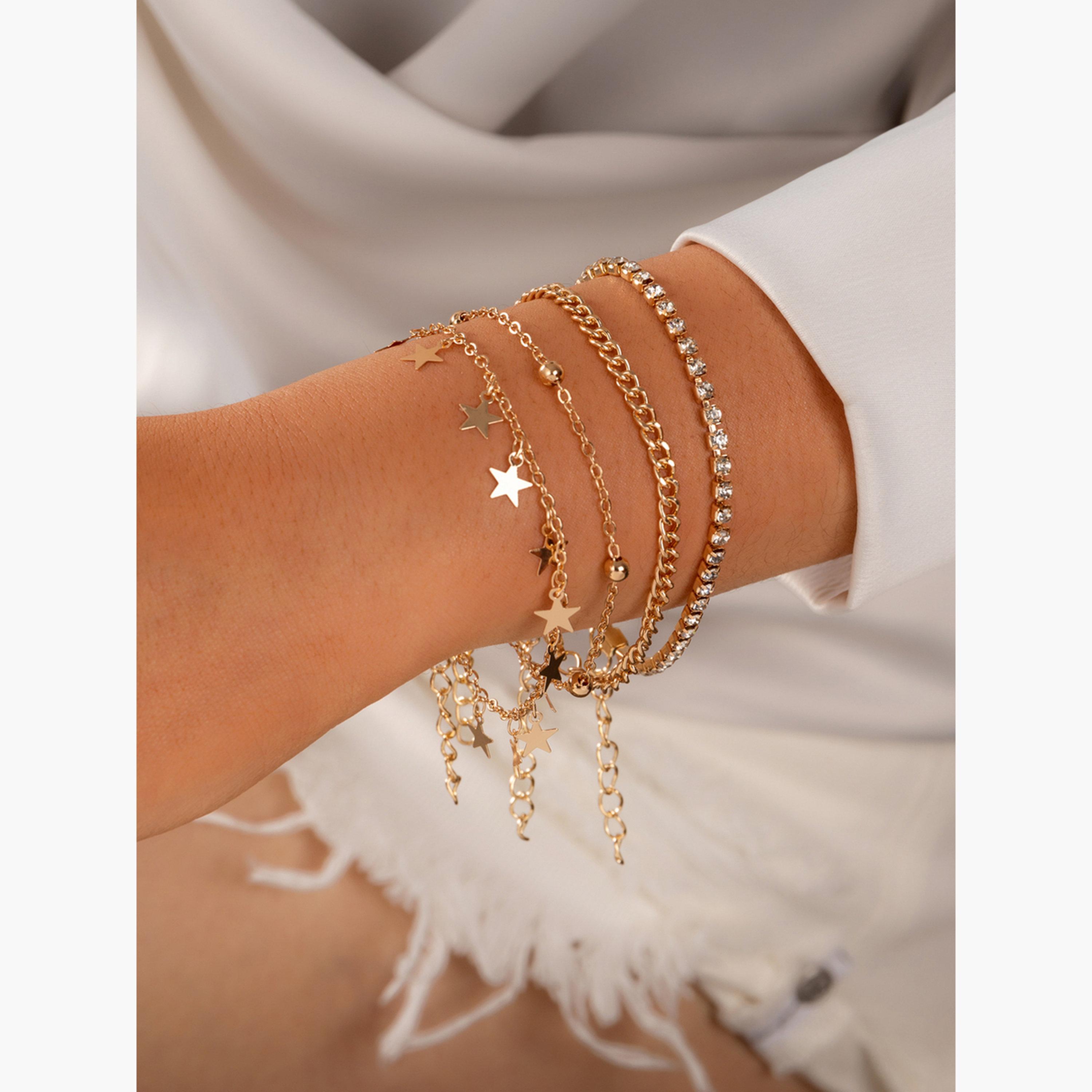 مجموعة من 4 أساور يد بتعليقة نجمة-women-watchesandjewellery-jewellery-banglesandbracelets-image-2