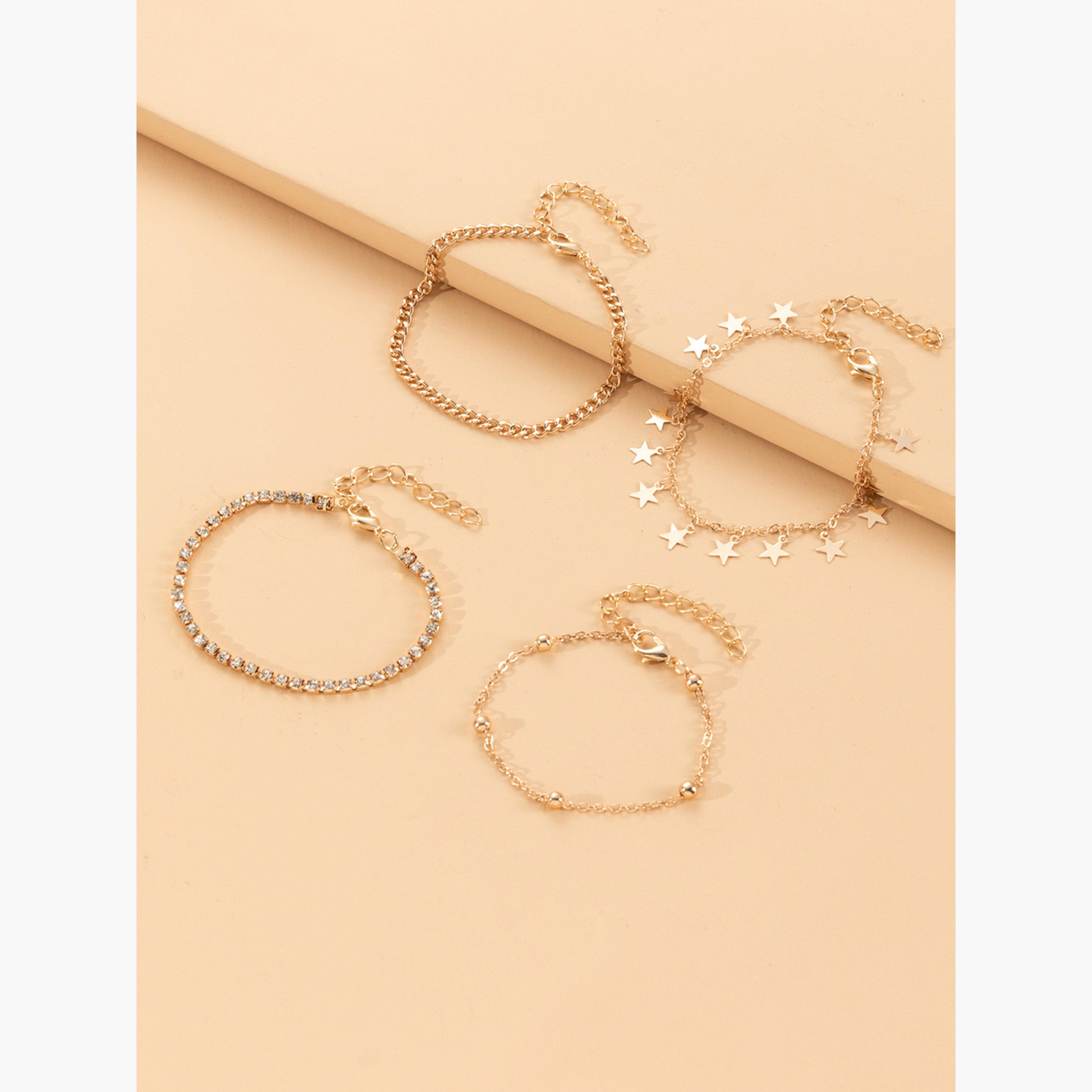 مجموعة من 4 أساور يد بتعليقة نجمة-women-watchesandjewellery-jewellery-banglesandbracelets-image-4