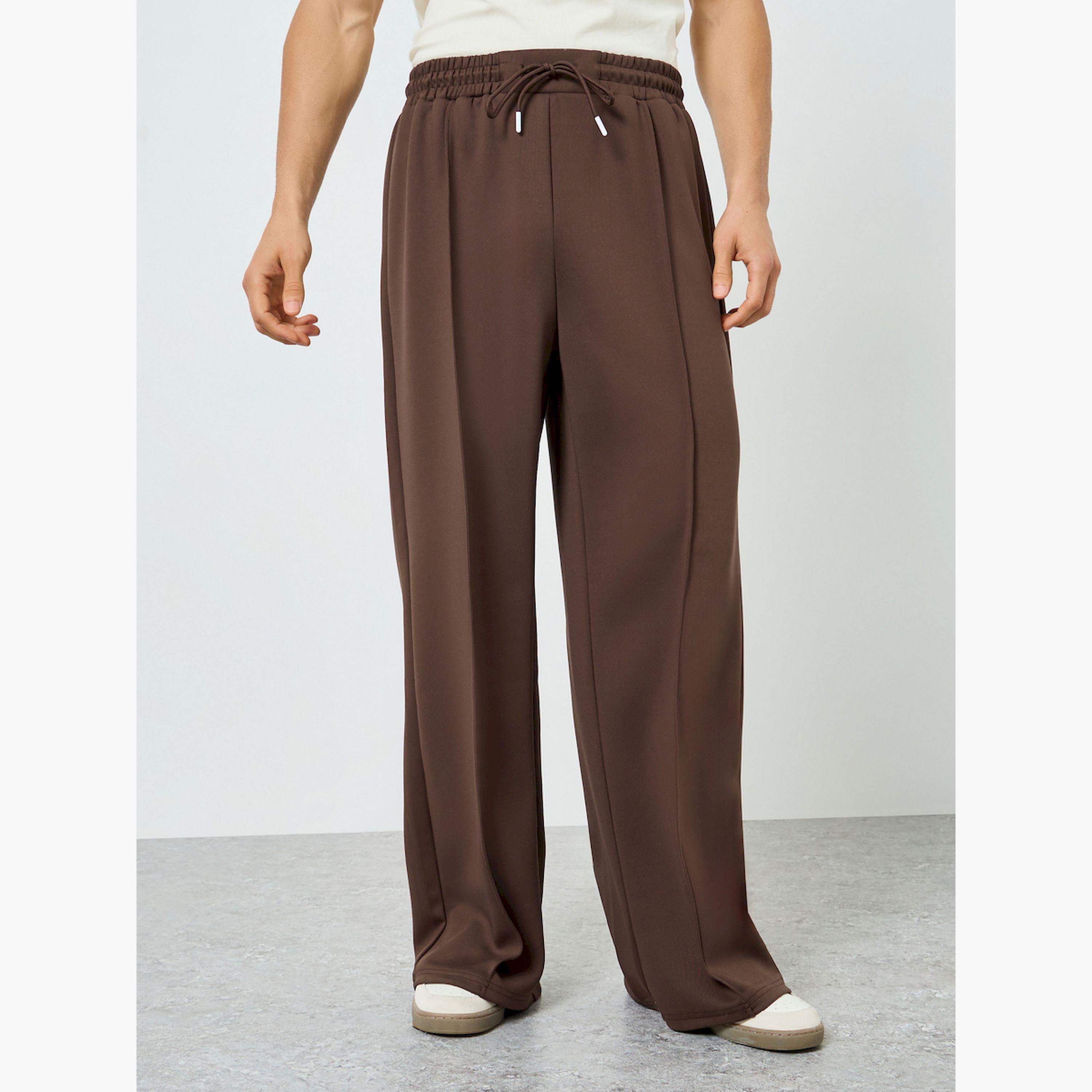 بنطال رياضي رجالي بني أرجل واسعة-men-clothing-bottoms-joggers-image-1