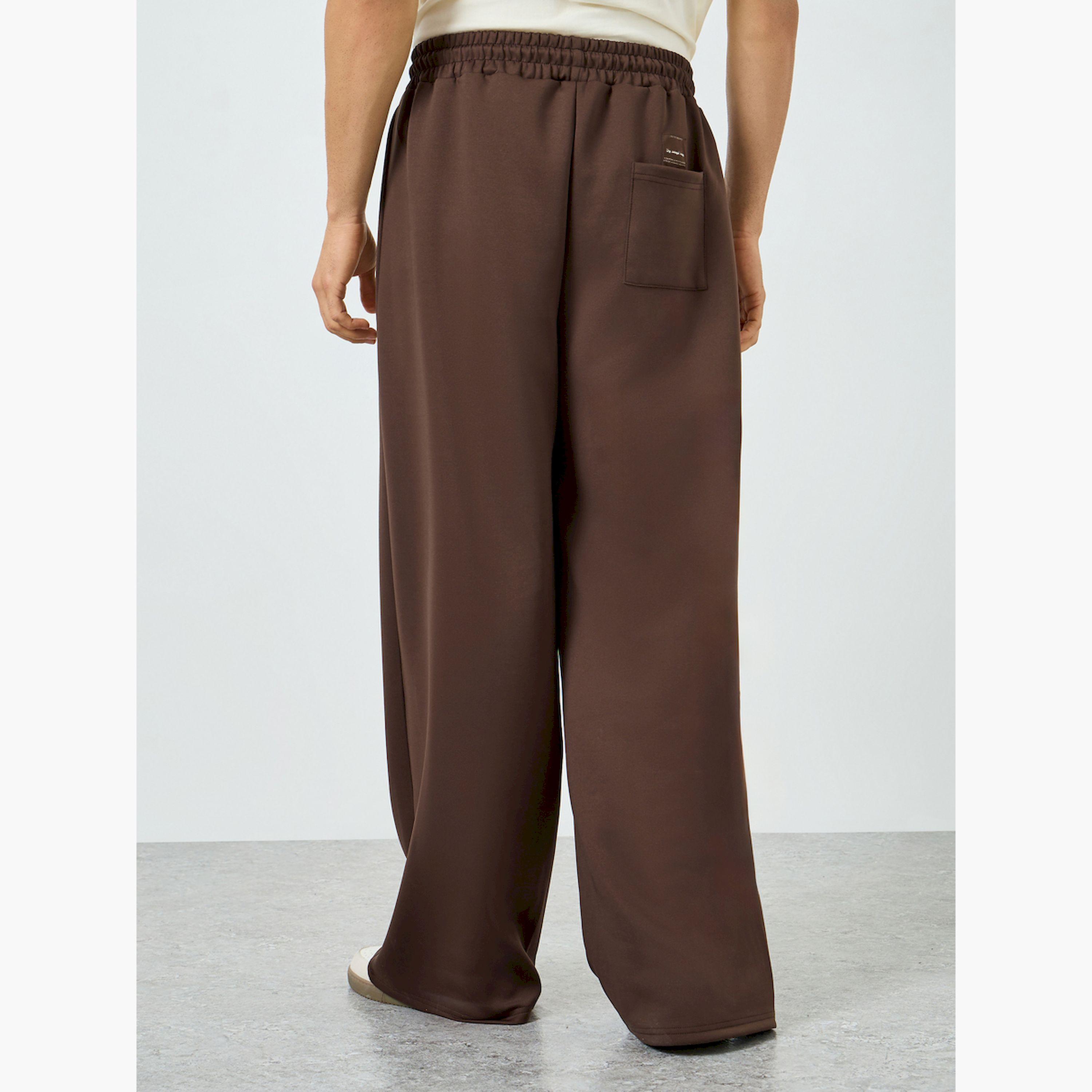 بنطال رياضي رجالي بني أرجل واسعة-men-clothing-bottoms-joggers-image-4