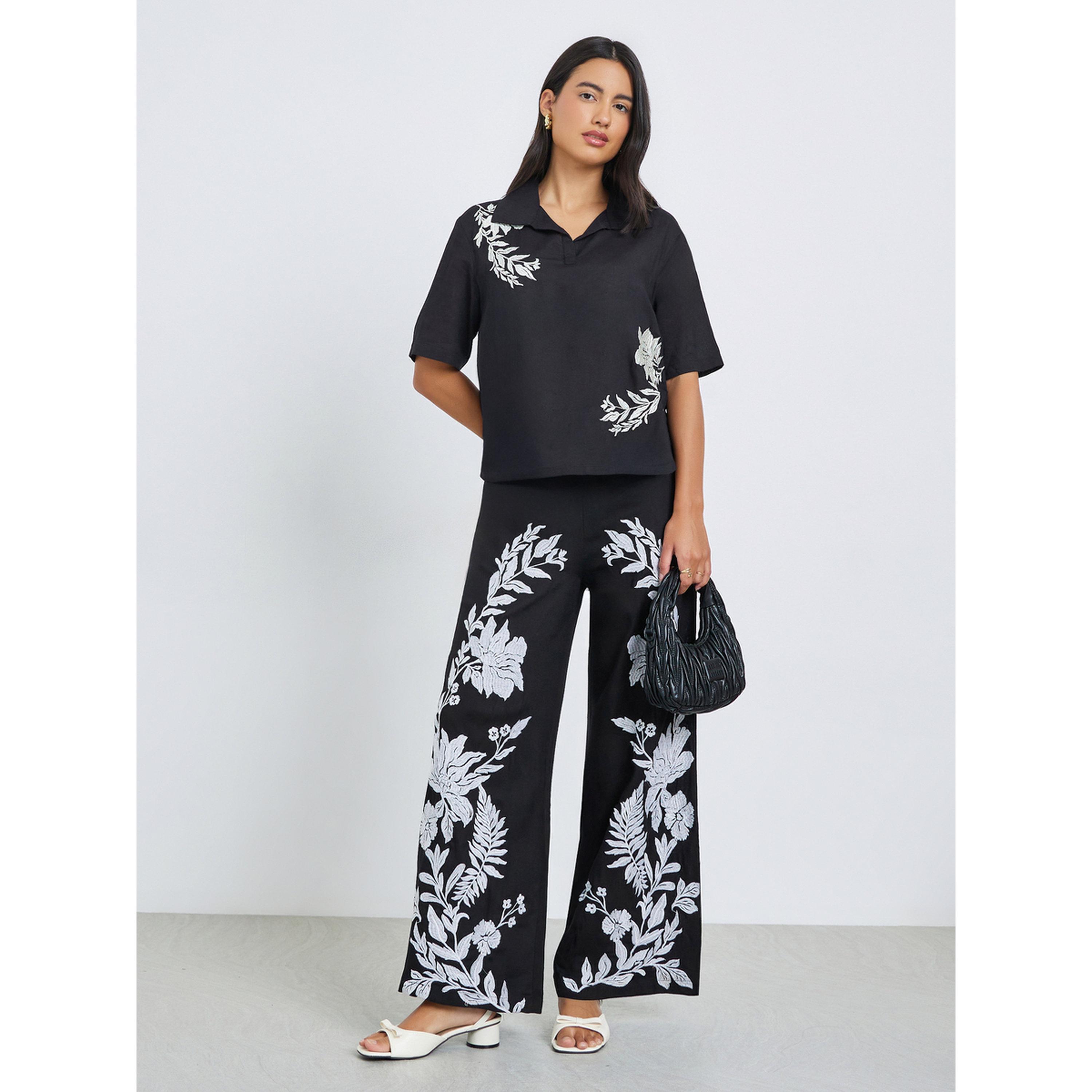بنطال بأرجل واسعة وتفاصيل مُطرّزة-women-clothing-bottoms-joggers-image-2