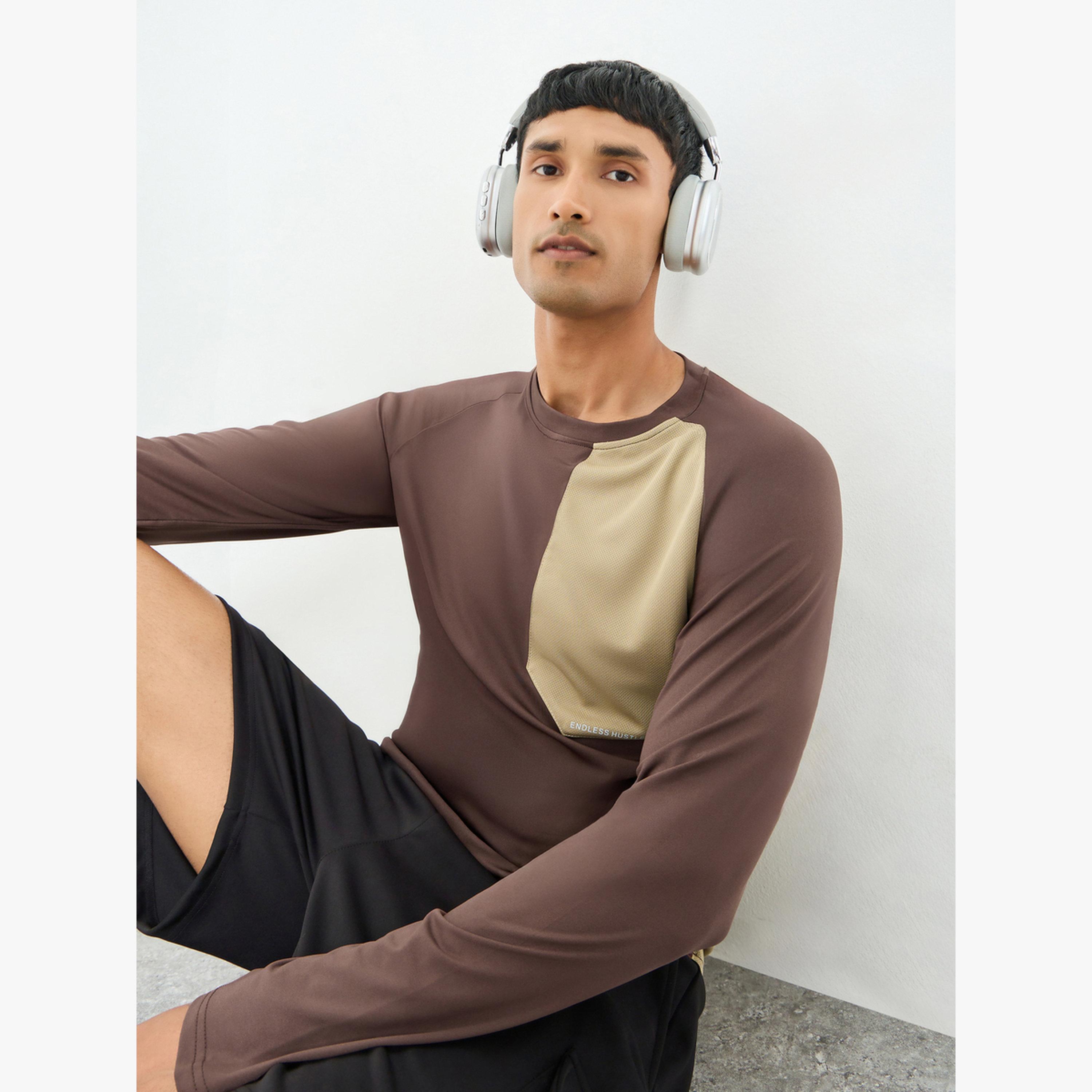 بلوزة تدريب بأكمام طويلة وأجزاء مباينة-men-clothing-sportswearandactivewear-tshirtsandpolos-image-3