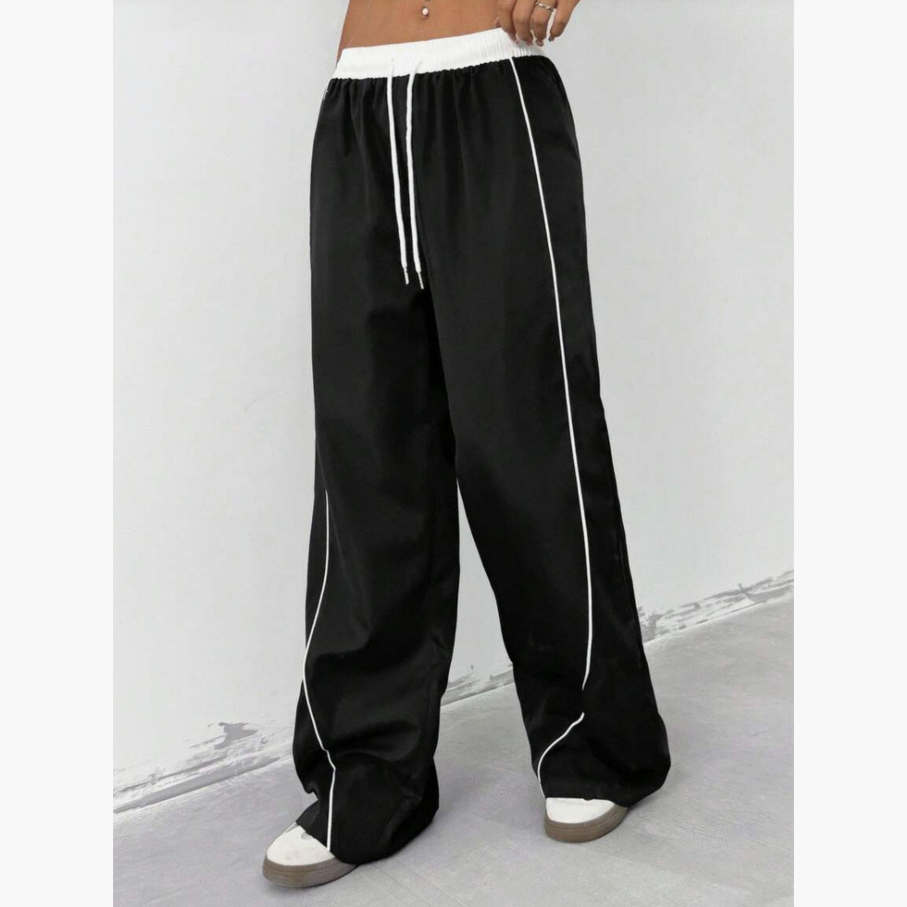 بنطال بأرجل واسعة أسود بتفاصيل بيضاء-women-clothing-bottoms-trousers-image-4