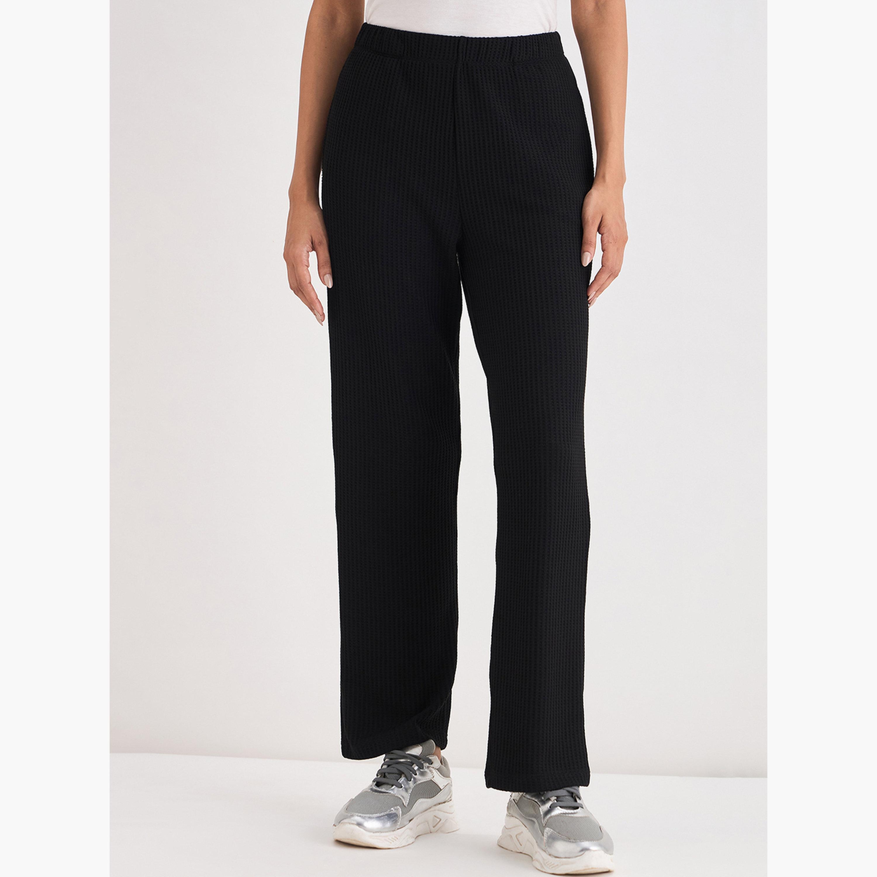 Femmella Women Black Waffle Knit Trousers-women-clothing-bottoms-joggers-image-1