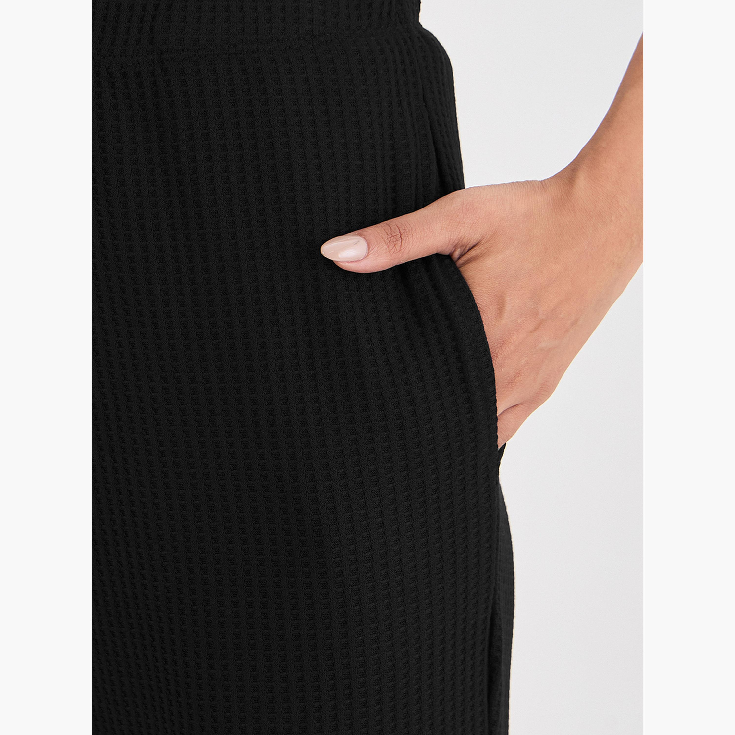 Femmella Women Black Waffle Knit Trousers-women-clothing-bottoms-joggers-image-4