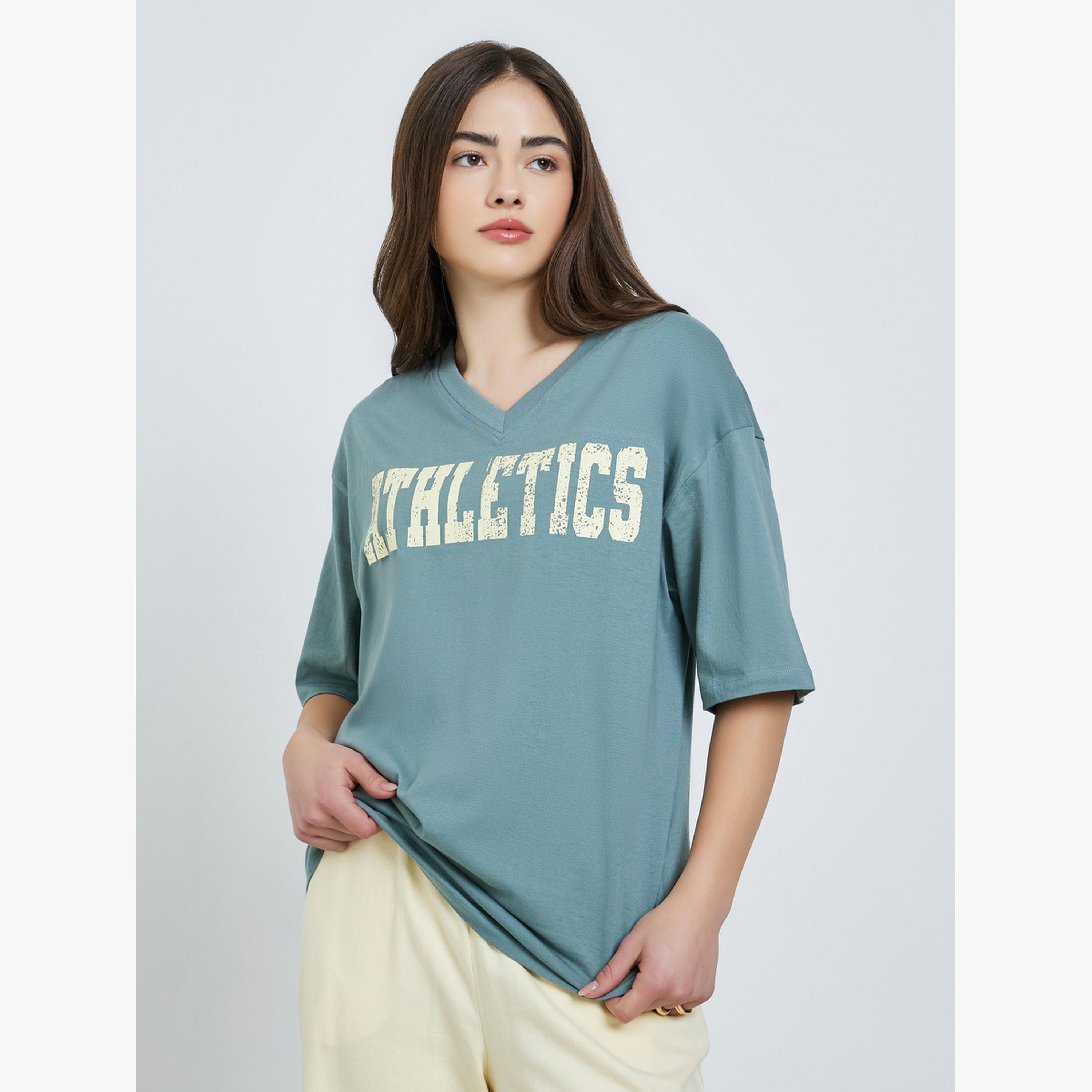 Styli Green Oversized Athletics Print Cotton T-Shirt-women-clothing-tshirts-image-1