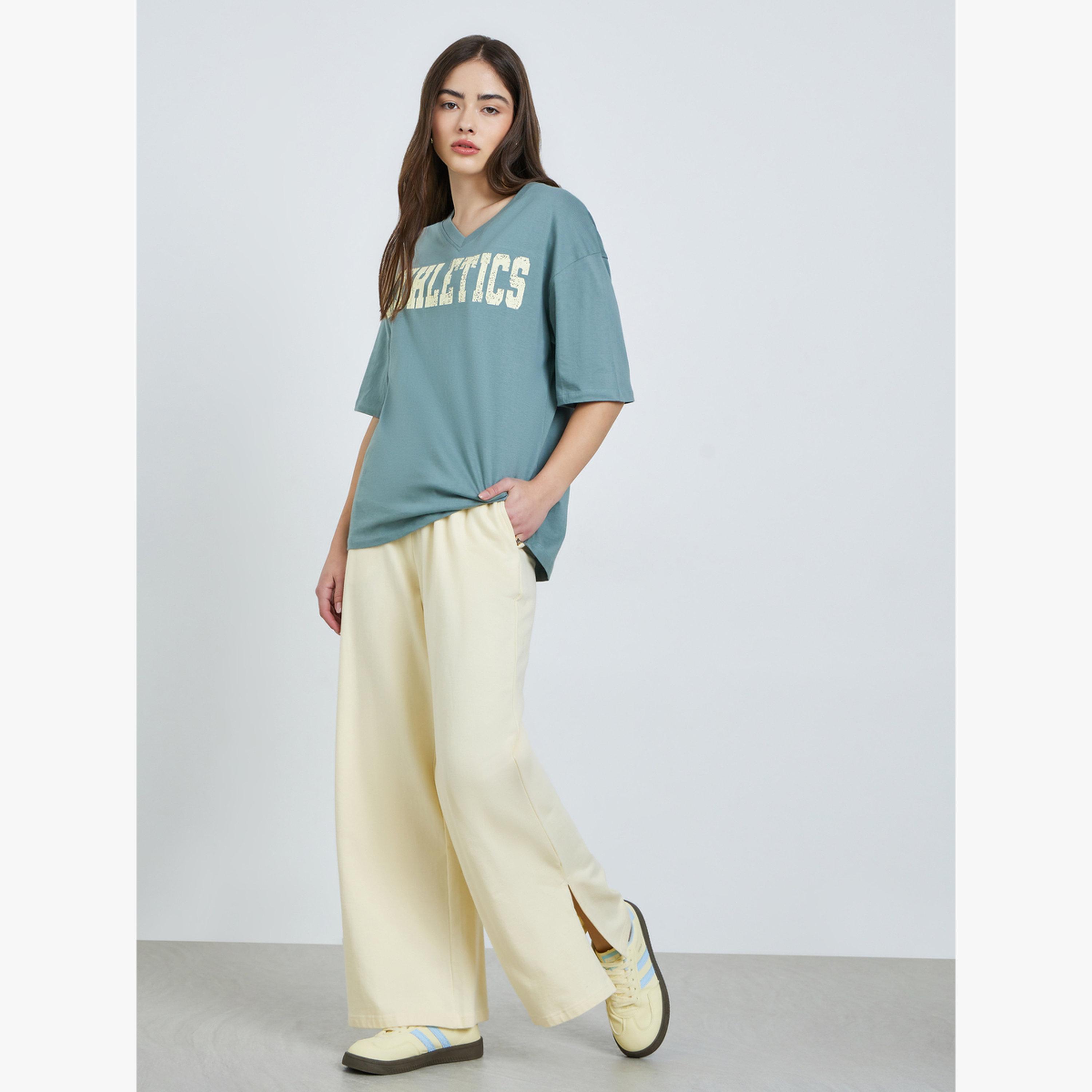 Styli Green Oversized Athletics Print Cotton T-Shirt-women-clothing-tshirts-image-2