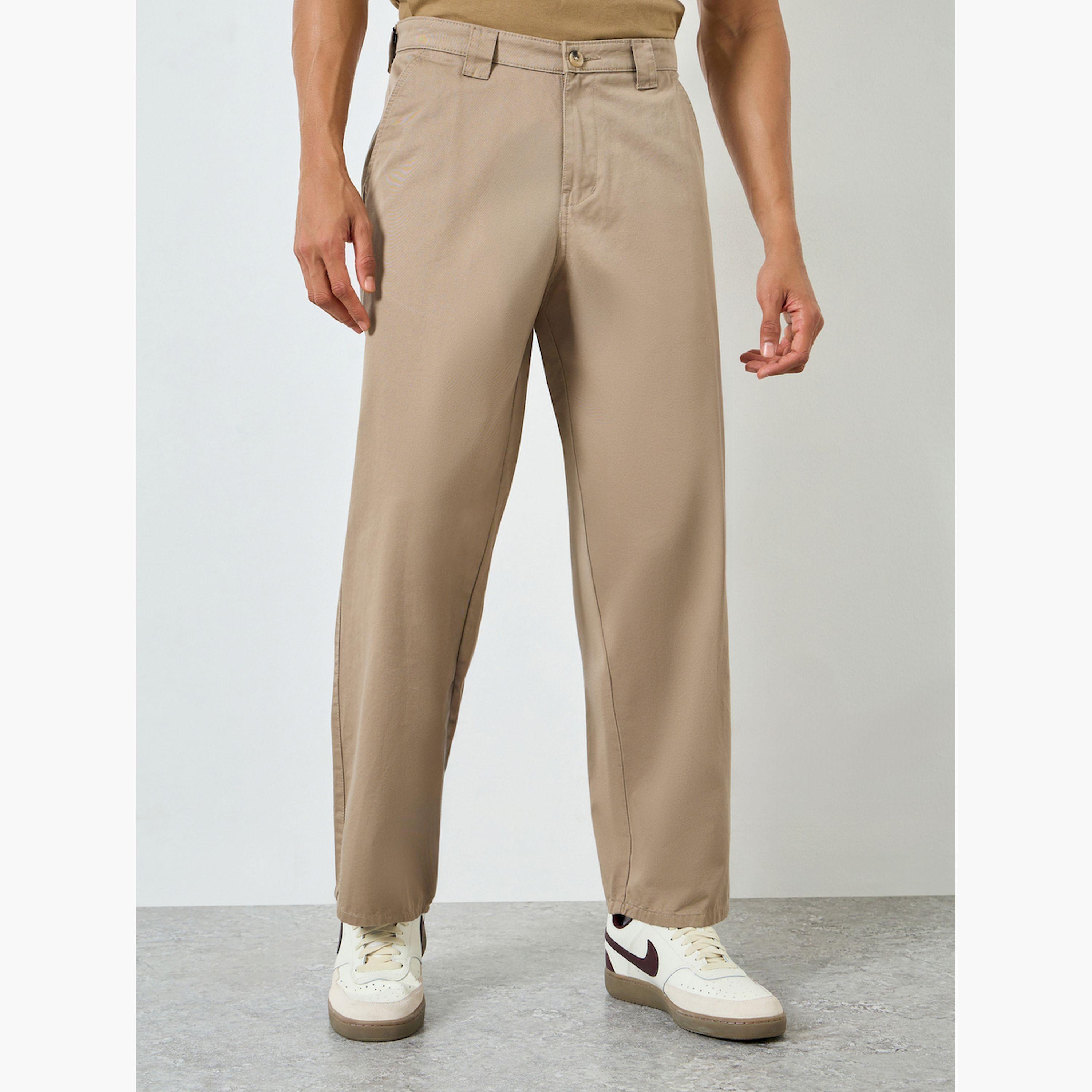 بنطال رجالي بيج بقصة واسعة-men-clothing-bottoms-trousersandchinos-trousers-image-1