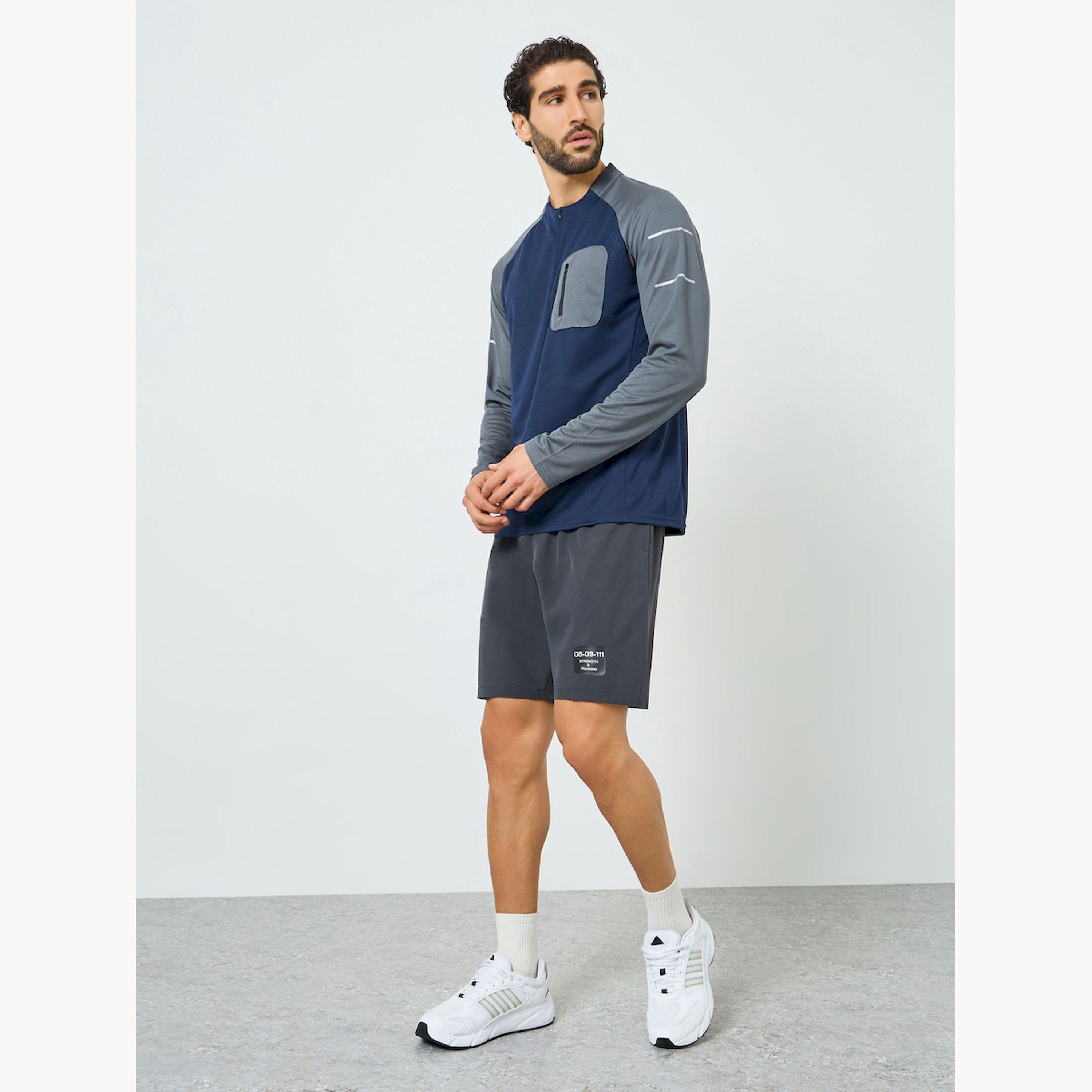بلوزة تدريب بأكمام راجلان متباينة-men-clothing-sportswearandactivewear-tshirtsandpolos-image-2