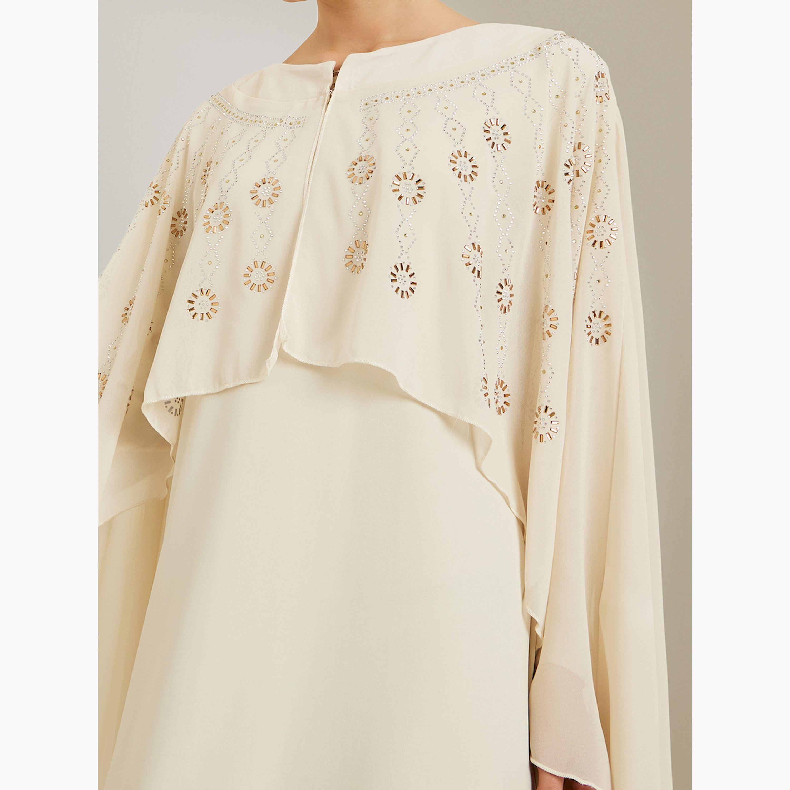 قفطان طويل كريمي بأكمام كيب مزينة-women-clothing-dresses-image-6