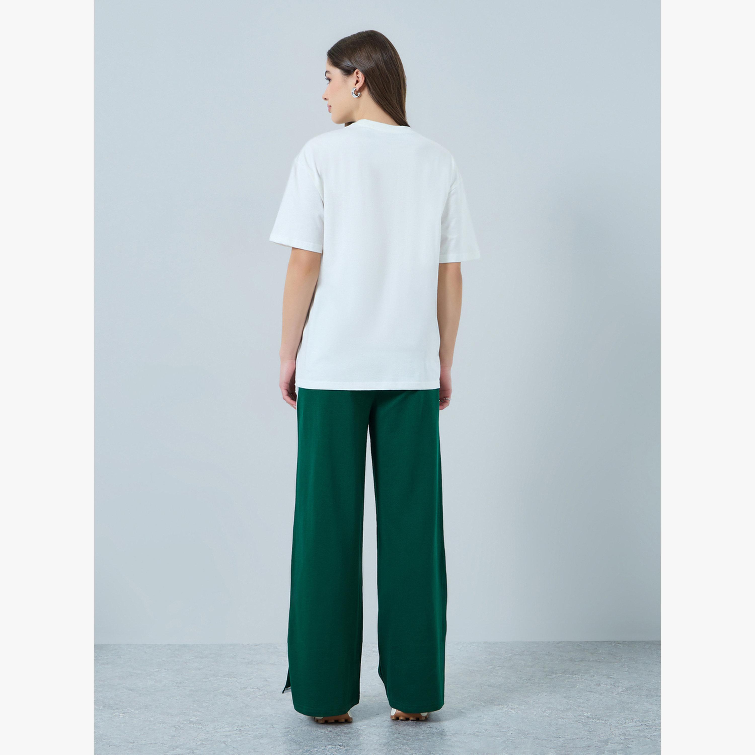 طقم منسق من تيشيرت قصة واسعة وجوغر بأرجل واسعة-women-clothing-coordsets-image-4