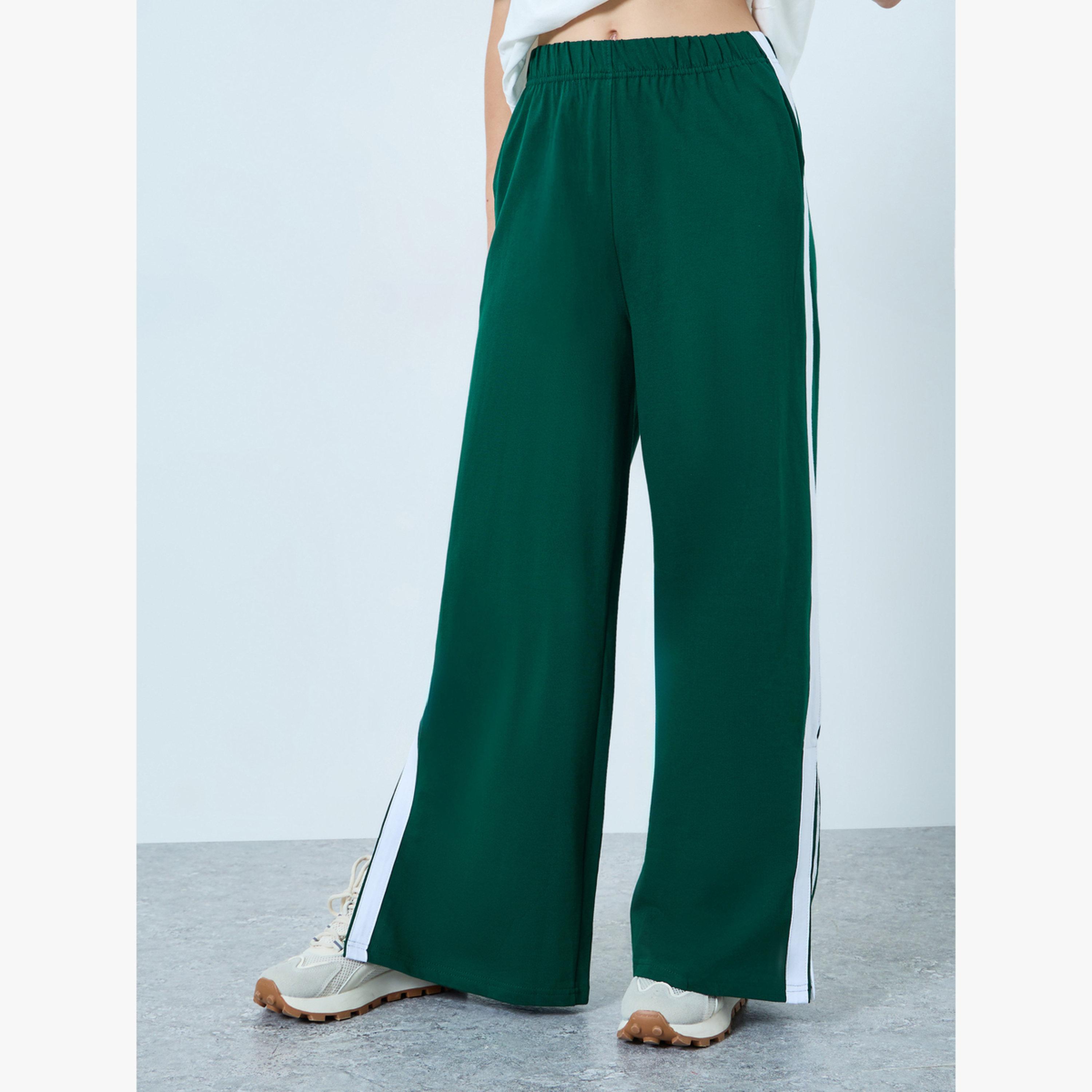 طقم منسق من تيشيرت قصة واسعة وجوغر بأرجل واسعة-women-clothing-coordsets-image-5