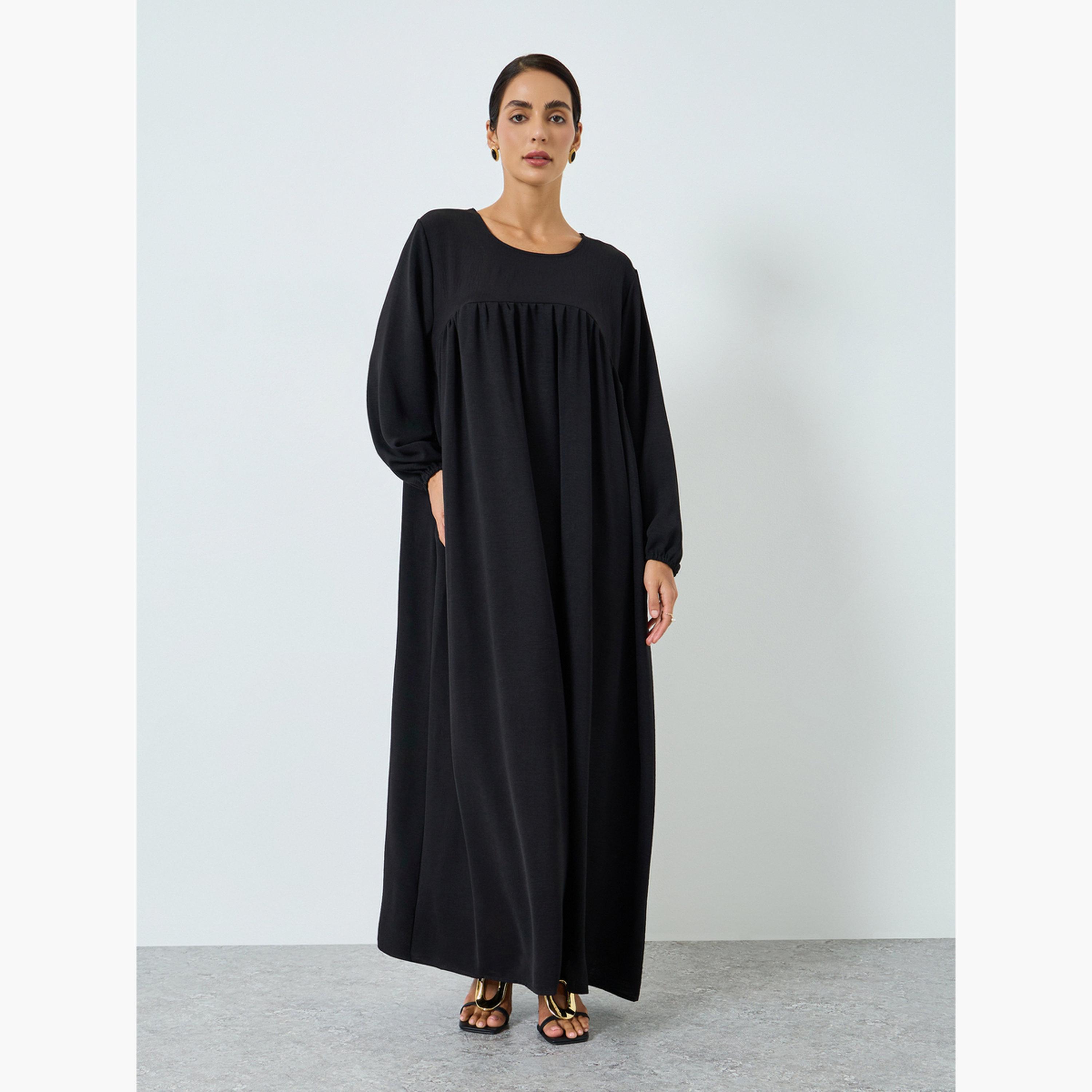 جلابية سوداء بياقة مستديرة وكسرات-women-arabicclothing-jalabiyas-image-1