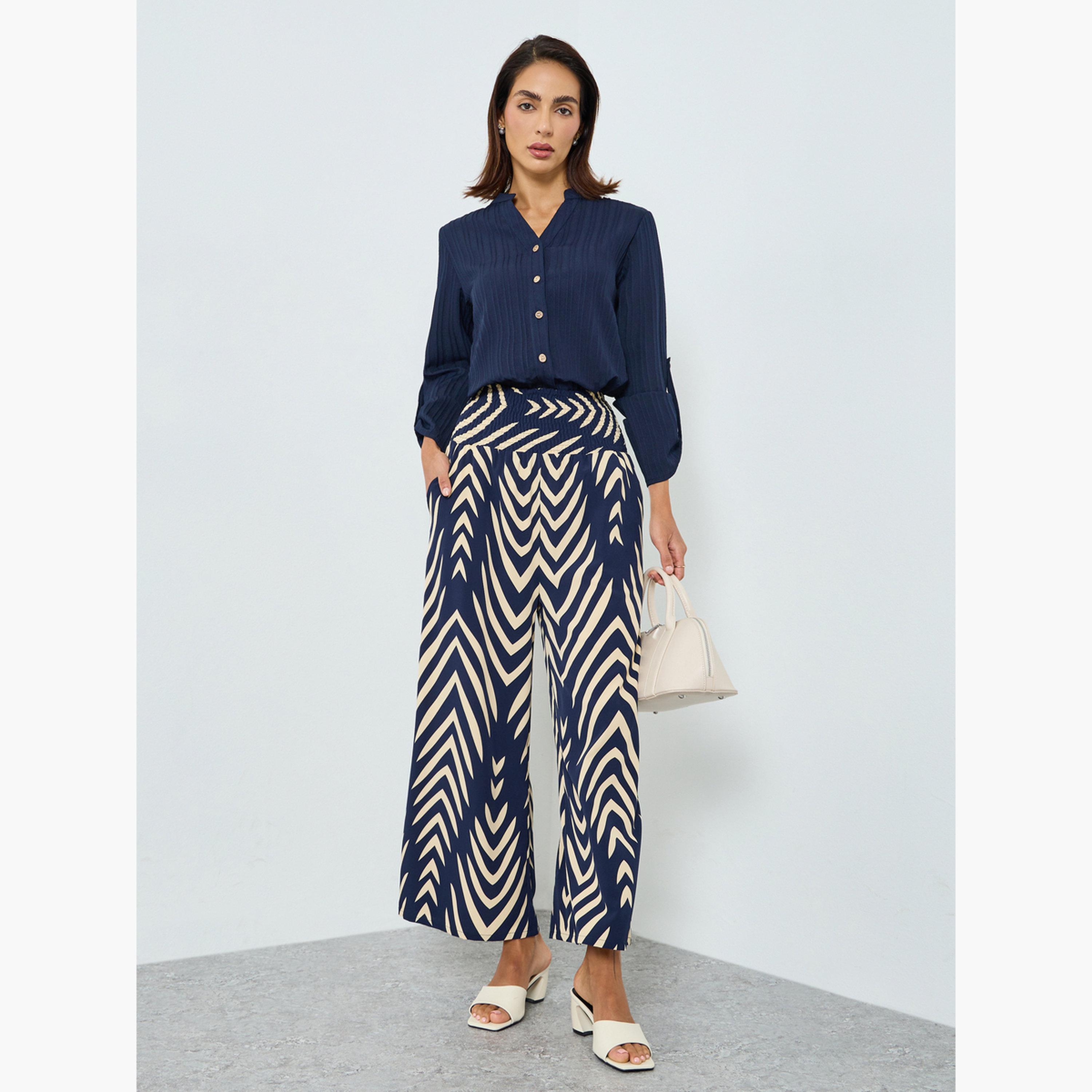 بنطال بأرجل واسعة وخصر عالي مرن ومقلم-women-clothing-bottoms-trousers-image-2