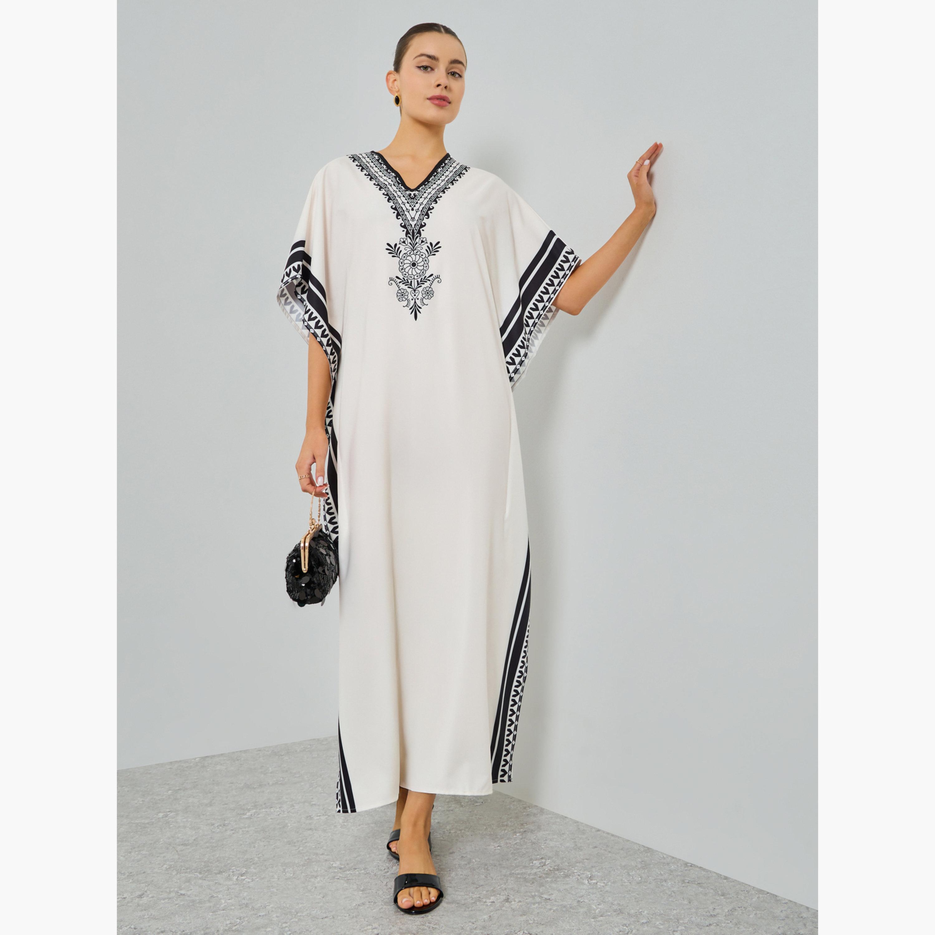 تيك تو - قفطان بيج مطبوع برسومات على شكل حرف V-women-arabicclothing-kaftan-image-2