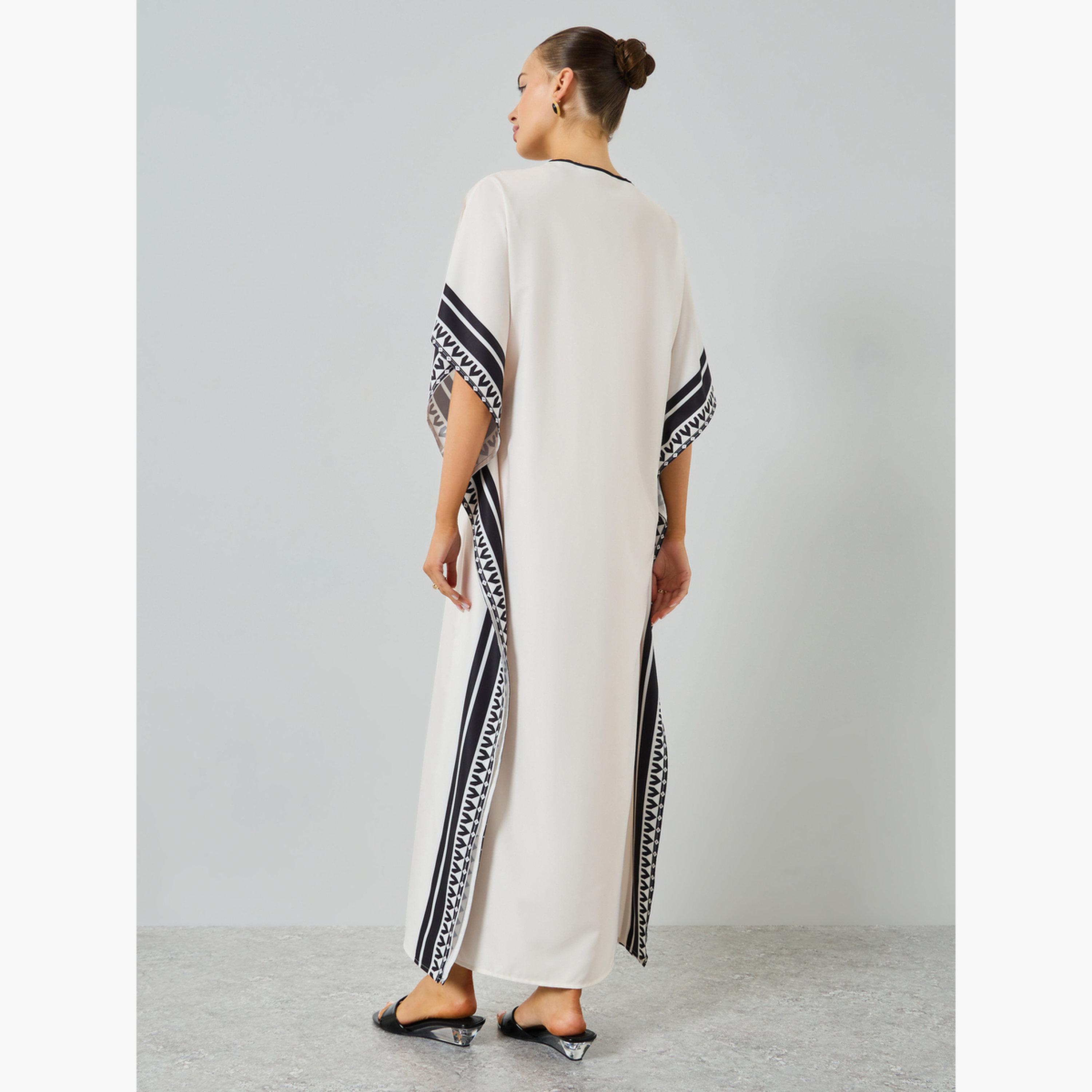 تيك تو - قفطان بيج مطبوع برسومات على شكل حرف V-women-arabicclothing-kaftan-image-5