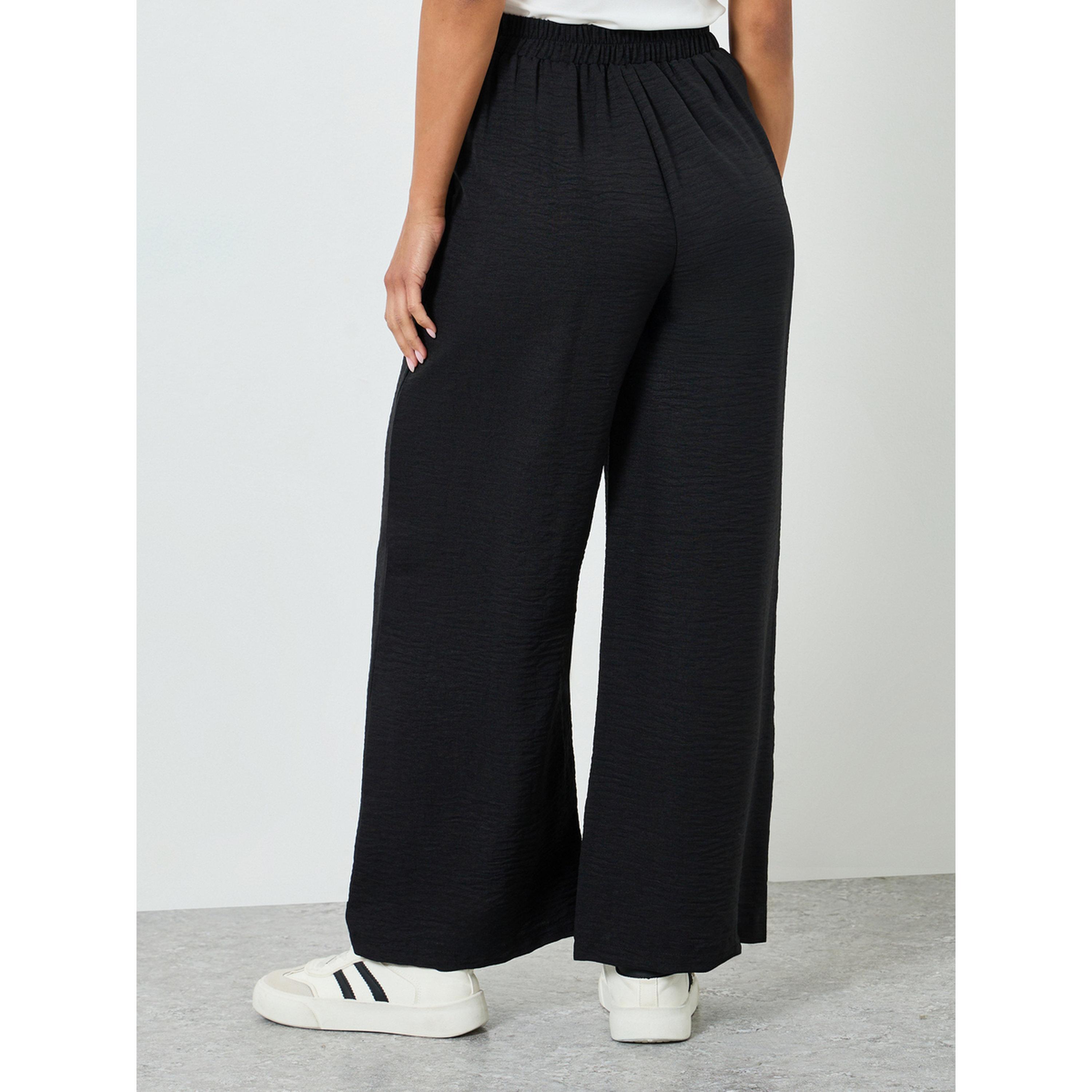 بنطال بأرجل واسعة لون أسود-women-clothing-bottoms-trousers-image-4