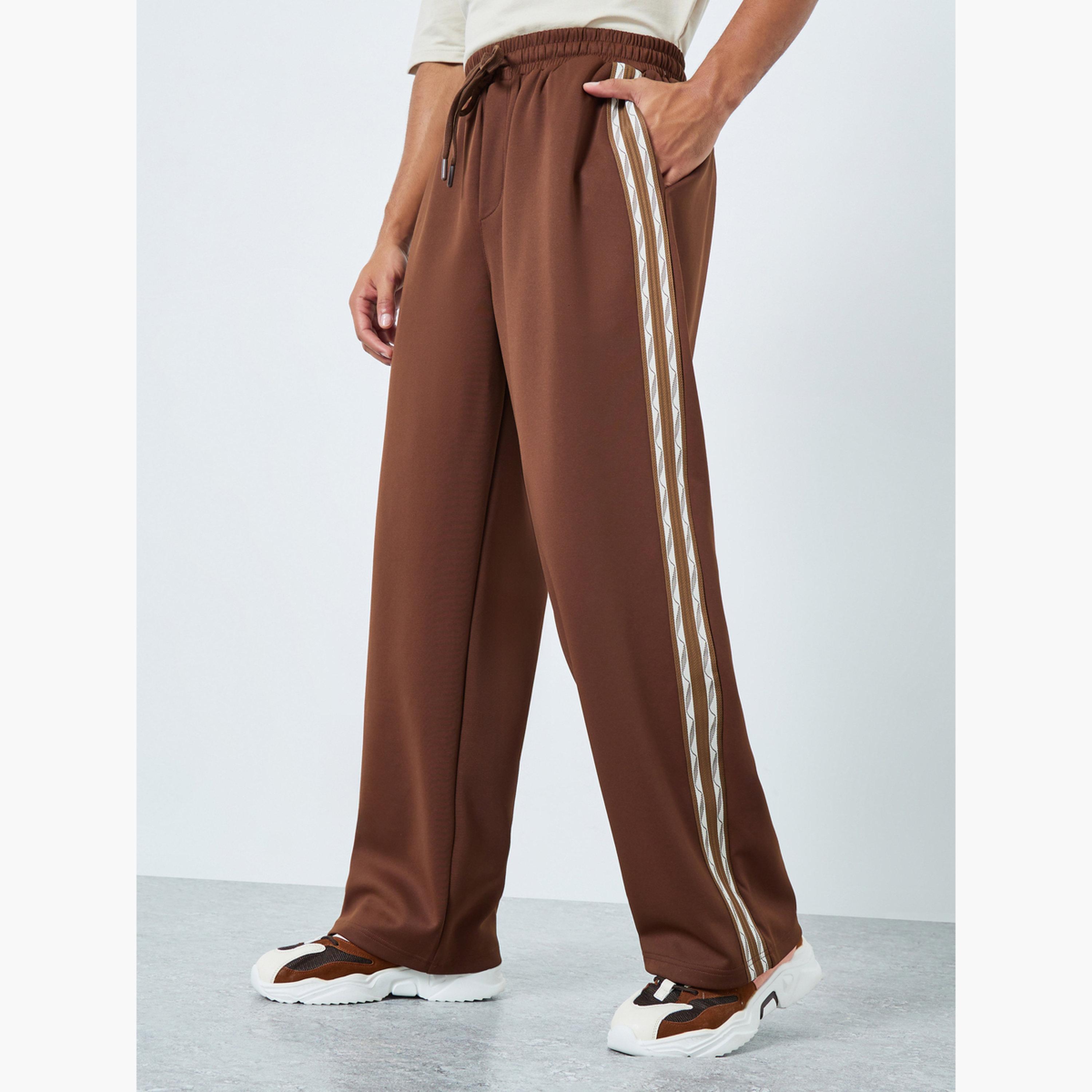 Styli Men Oversized Taped Open Hem Joggers-men-clothing-bottoms-joggers-image-1