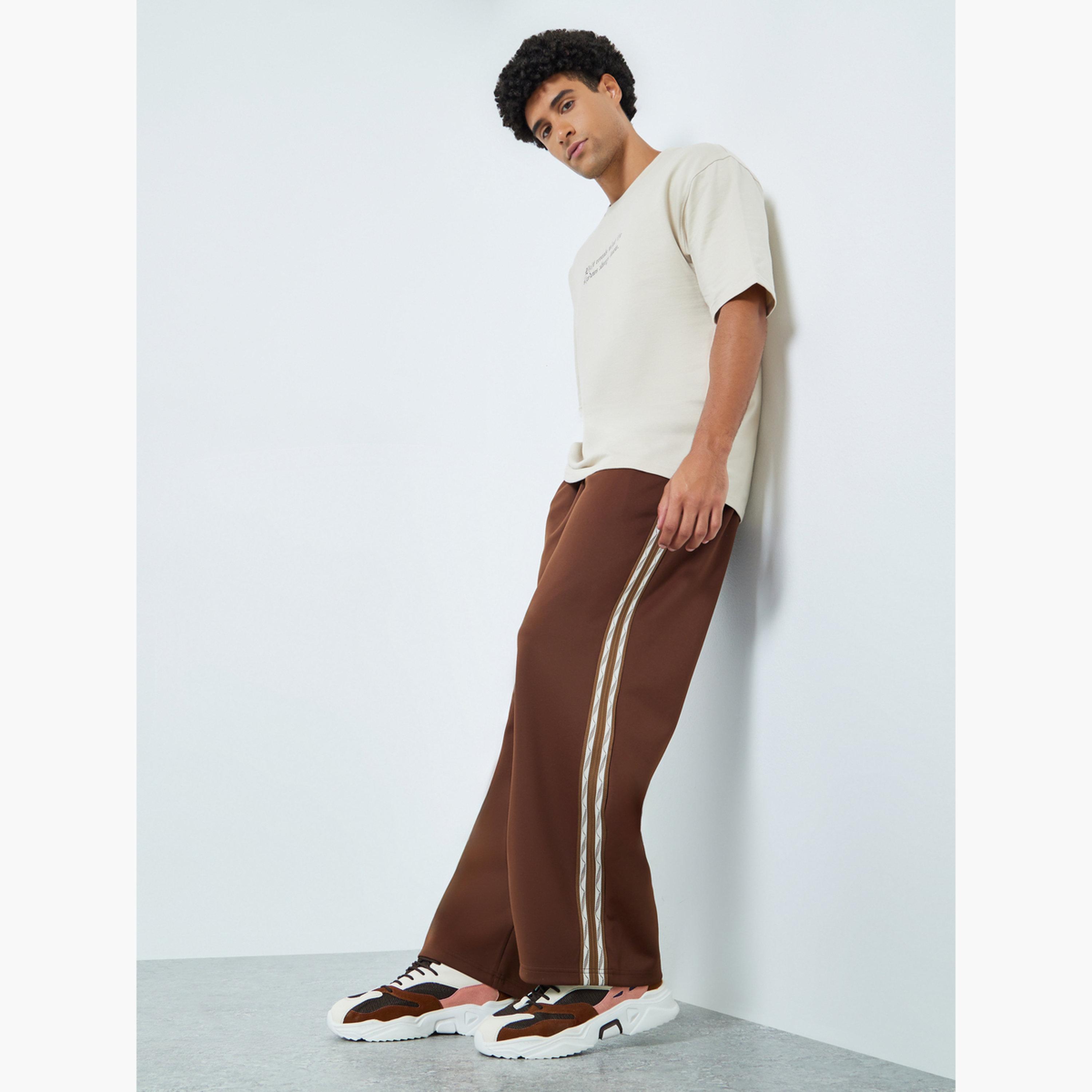 Styli Men Oversized Taped Open Hem Joggers-men-clothing-bottoms-joggers-image-2