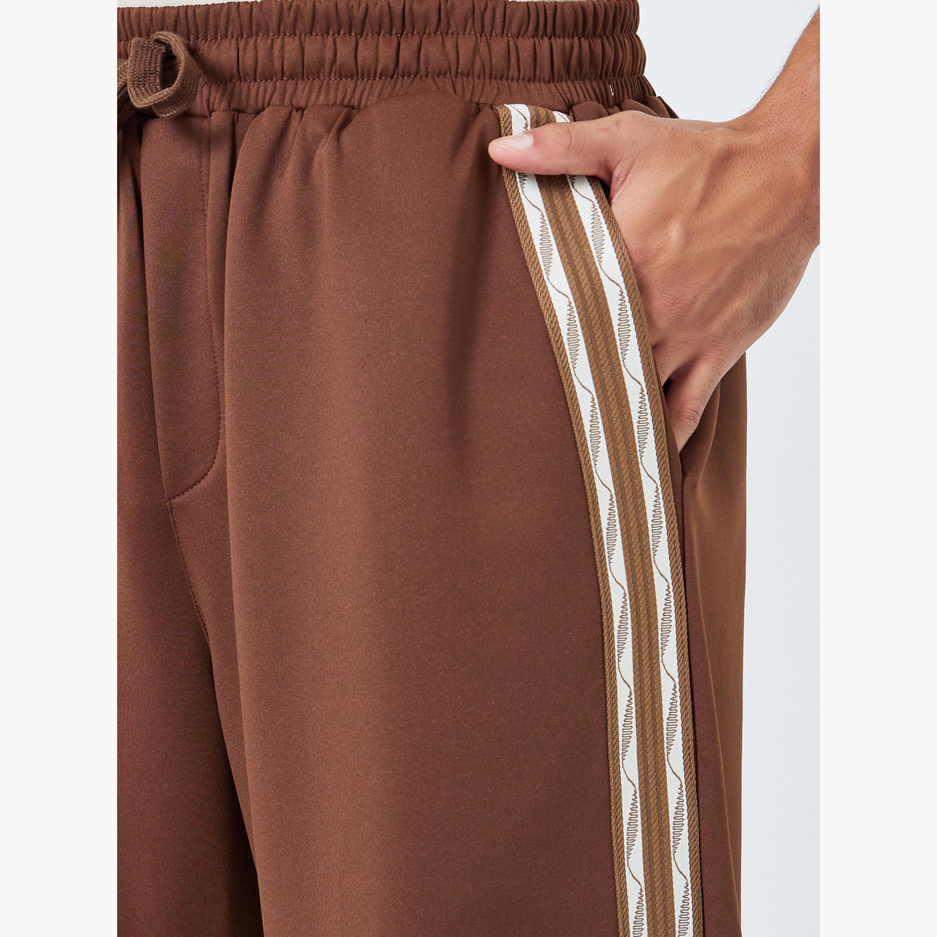 Styli Men Oversized Taped Open Hem Joggers-men-clothing-bottoms-joggers-image-4