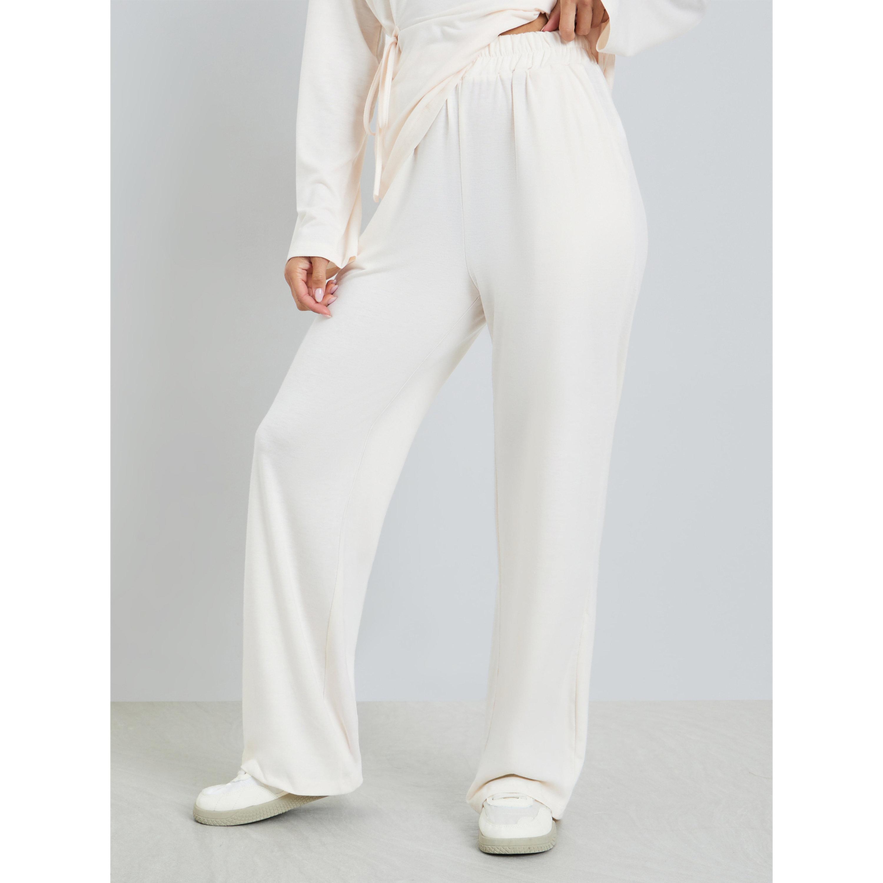 مجموعة نسائية بنمط توب برباط جانبي وبنطال واسع-women-clothing-coordsets-image-5