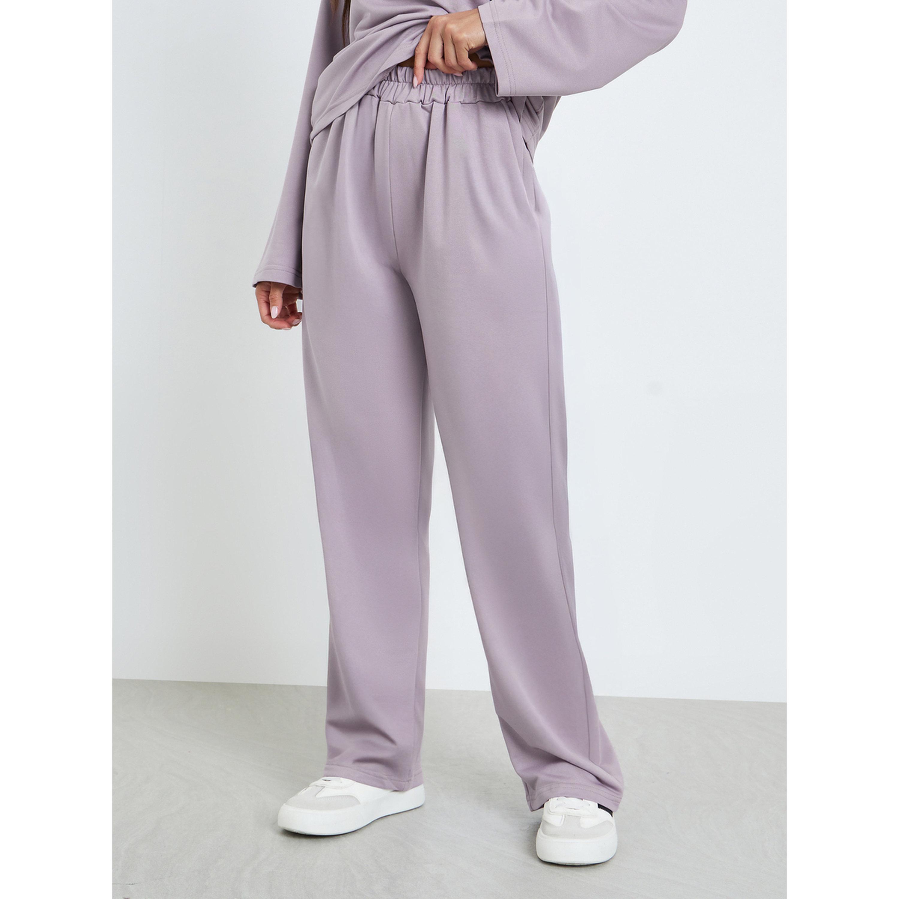 طقم من بلوزة بعقدة أمامية وجوغربأرجل واسعة-women-clothing-coordsets-image-4