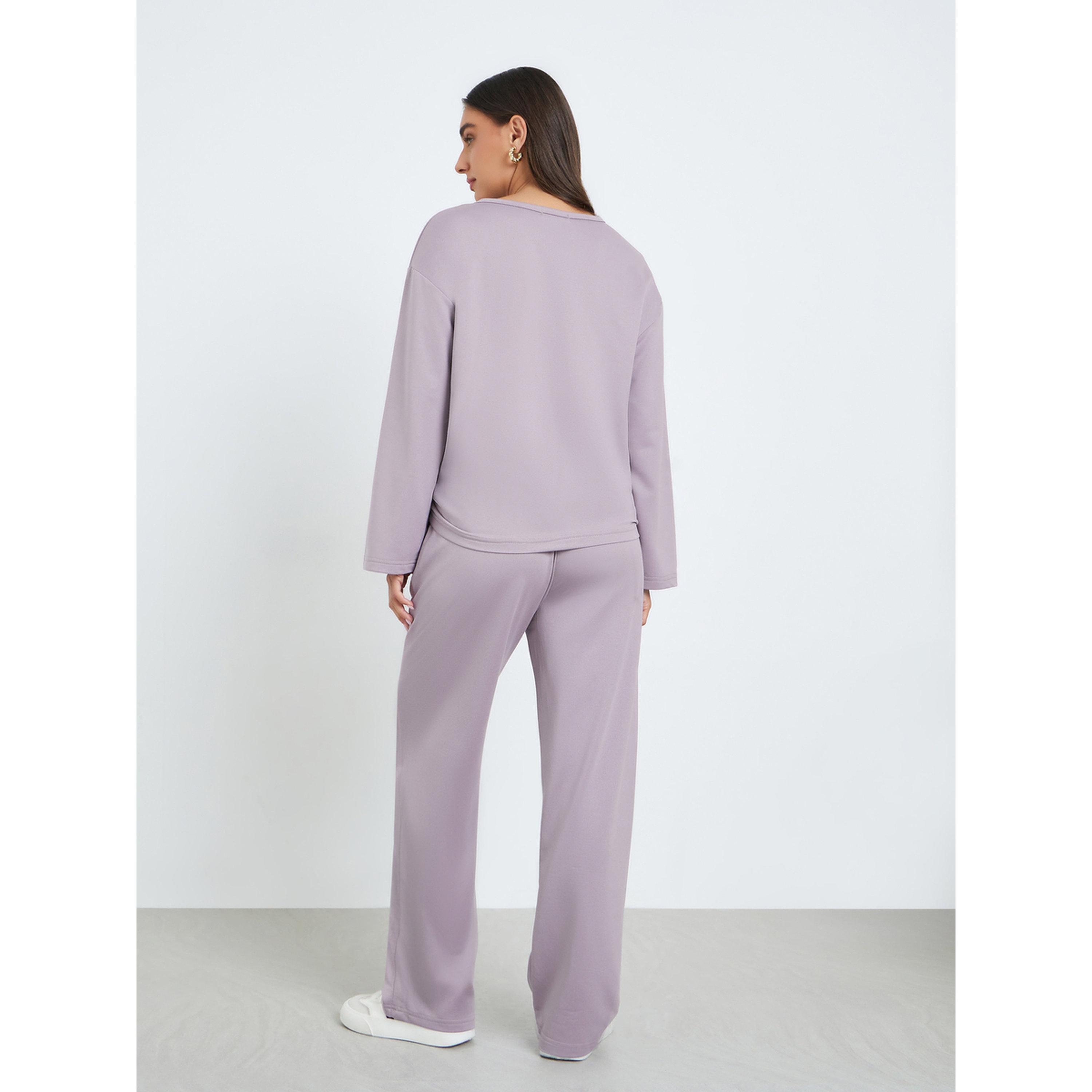 طقم من بلوزة بعقدة أمامية وجوغربأرجل واسعة-women-clothing-coordsets-image-5