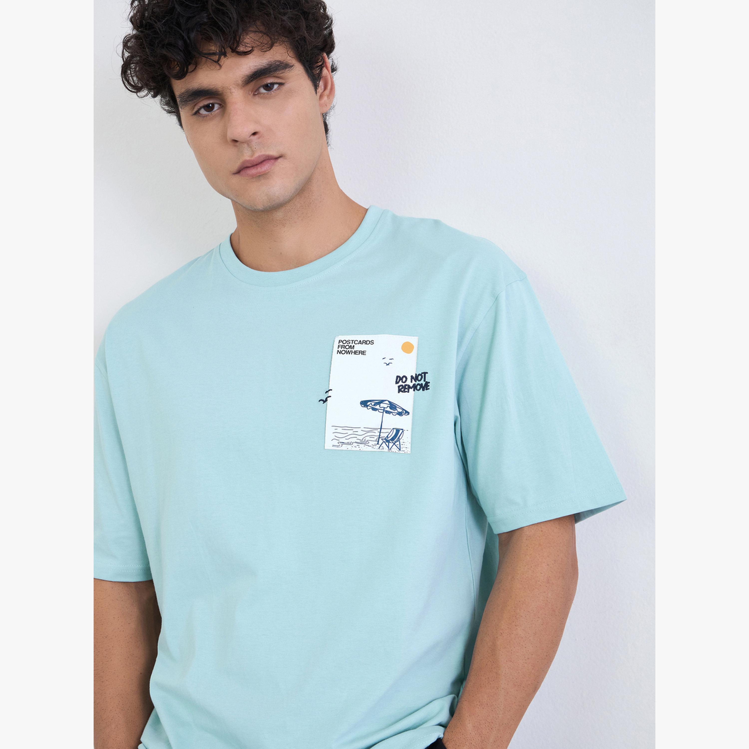 تيشيرت قطن كبير الحجم ومغسول بطبعة نص تويرل للرجال لون أزرق-men-clothing-tshirtsandpolos-tshirts-image-5