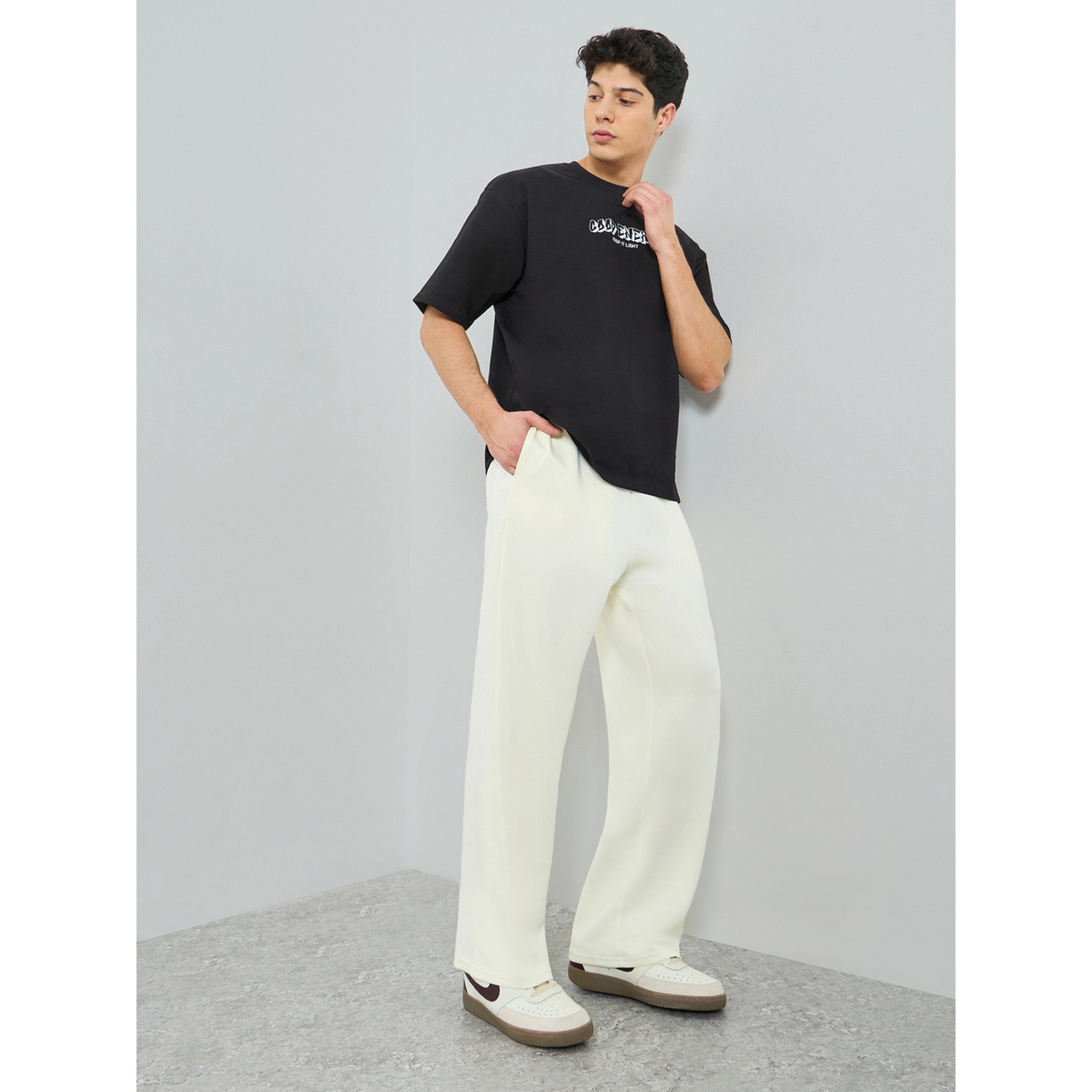 بنطال بقصة واسعة وشارة جيب-men-clothing-bottoms-trousersandchinos-trousers-image-2