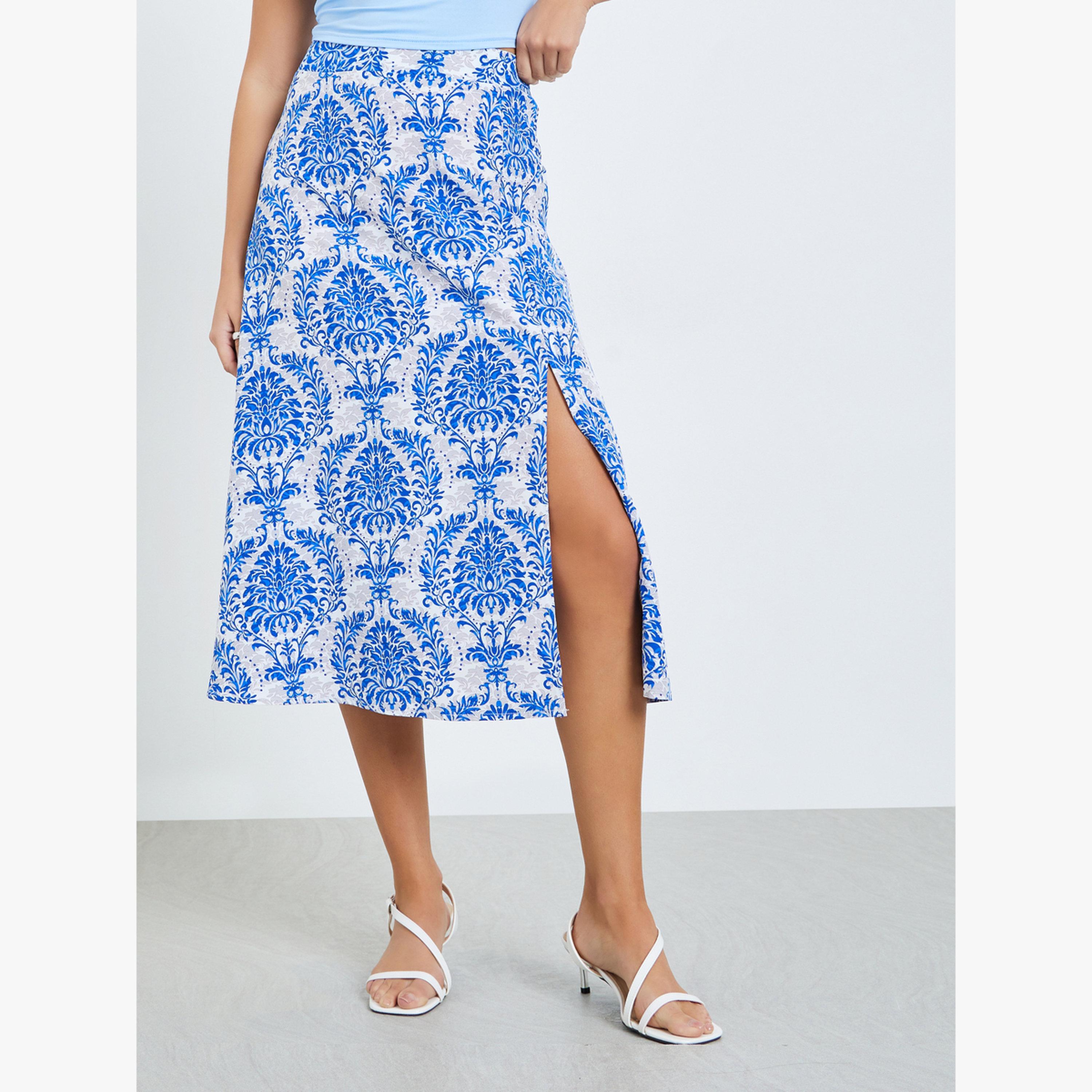 طقم منسق من تنورة بطبعة زهور وبلوزة ضيقة-women-clothing-coordsets-image-5