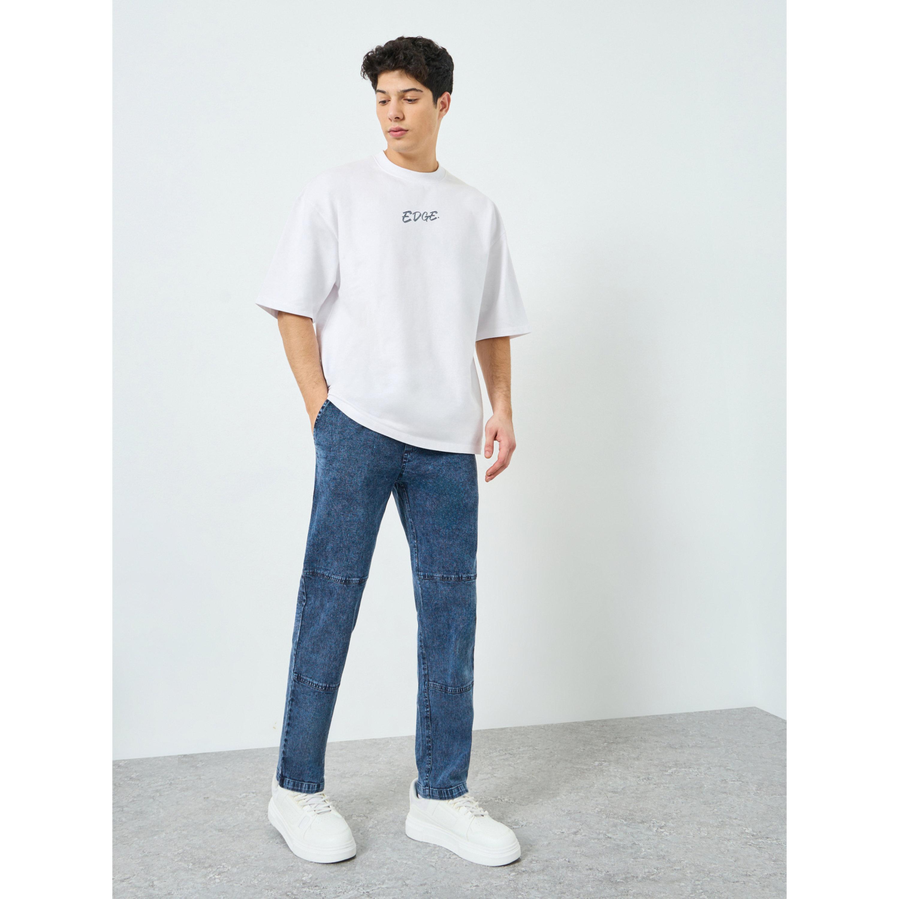 ستايلي - بنطلون رجالي من قماش شامبراي مغسول بتفاصيل قص وخياطة-men-clothing-bottoms-joggers-image-2