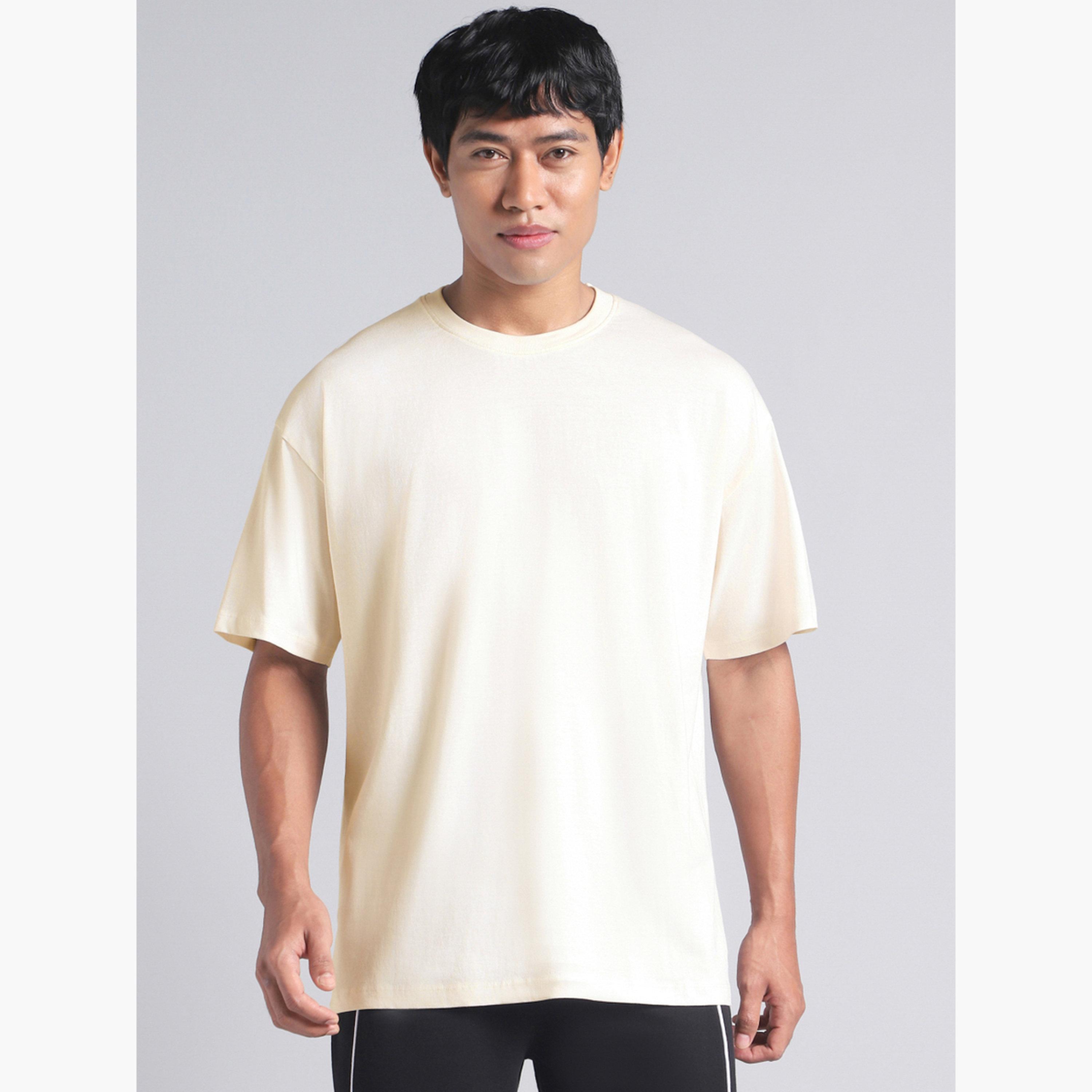 تيشيرت رجالي غرافيك بقصة واسعة باللون الأبيض المائل للسكري من Cult X Styli-men-clothing-sportswearandactivewear-tshirtsandpolos-image-1