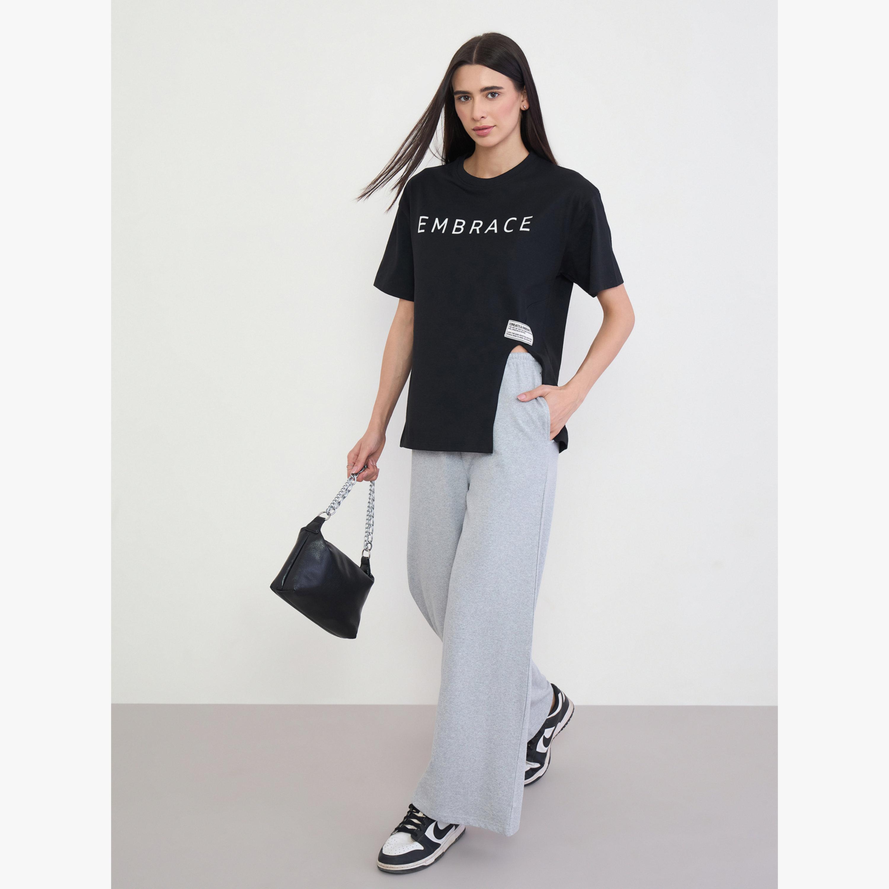 Styli Black 100% Cotton Oversized T-Shirt with Slit and Badge Detail-women-clothing-tshirts-image-2