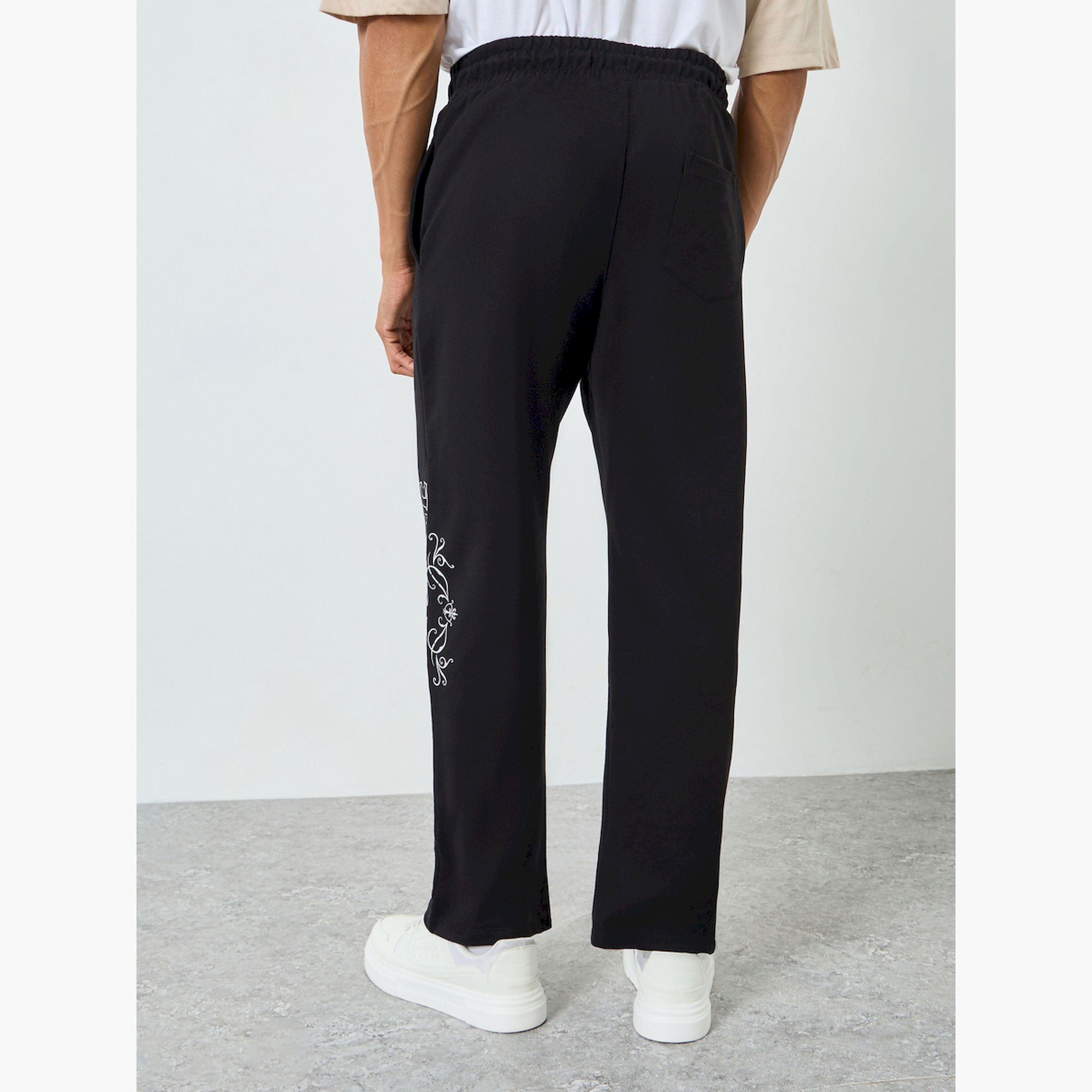 جوغر رجالي أسود بطبعة جرافيك تراثية-men-clothing-bottoms-joggers-image-4