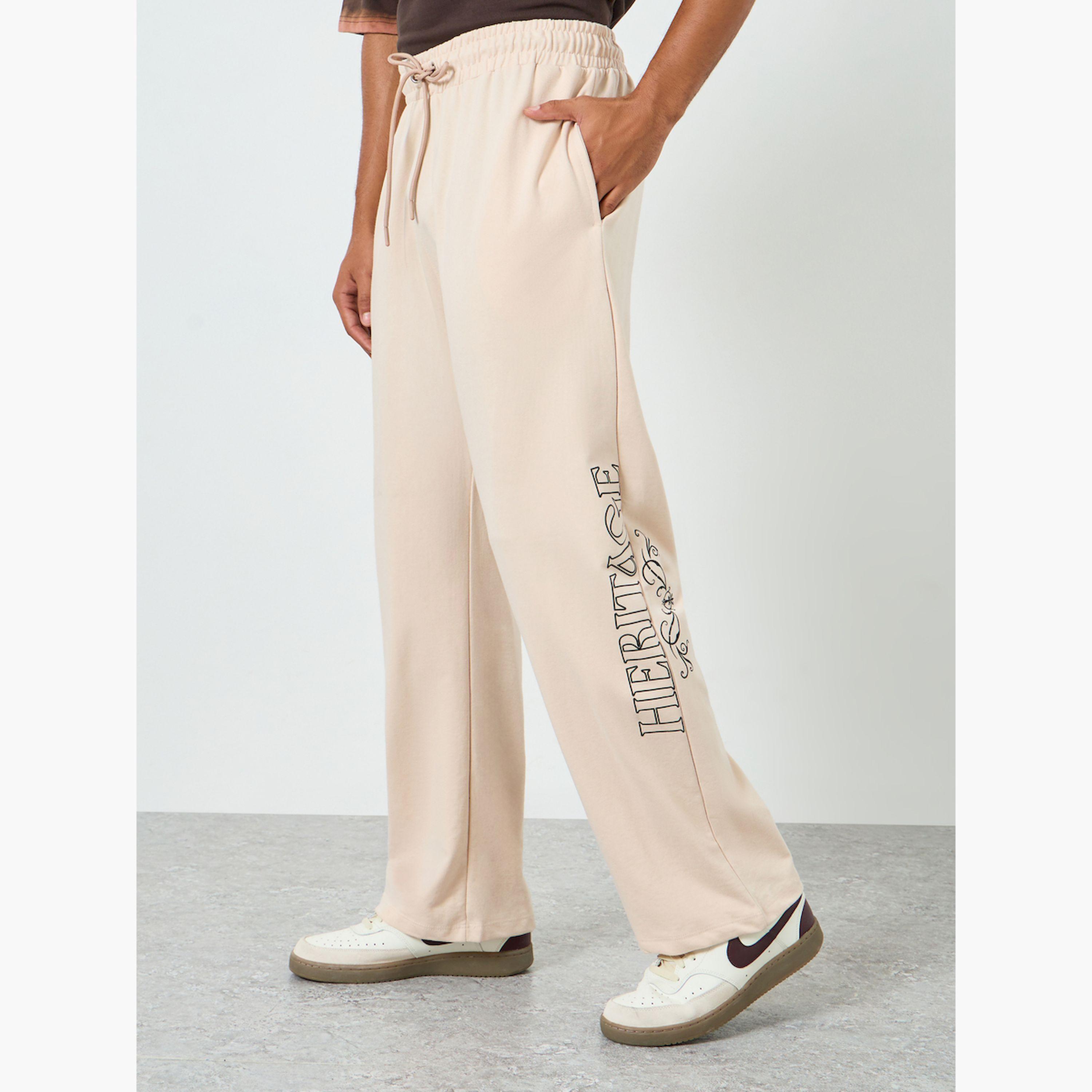 بنطال جوغر بطبعة رسومات وقصة واسعة-men-clothing-bottoms-joggers-image-1