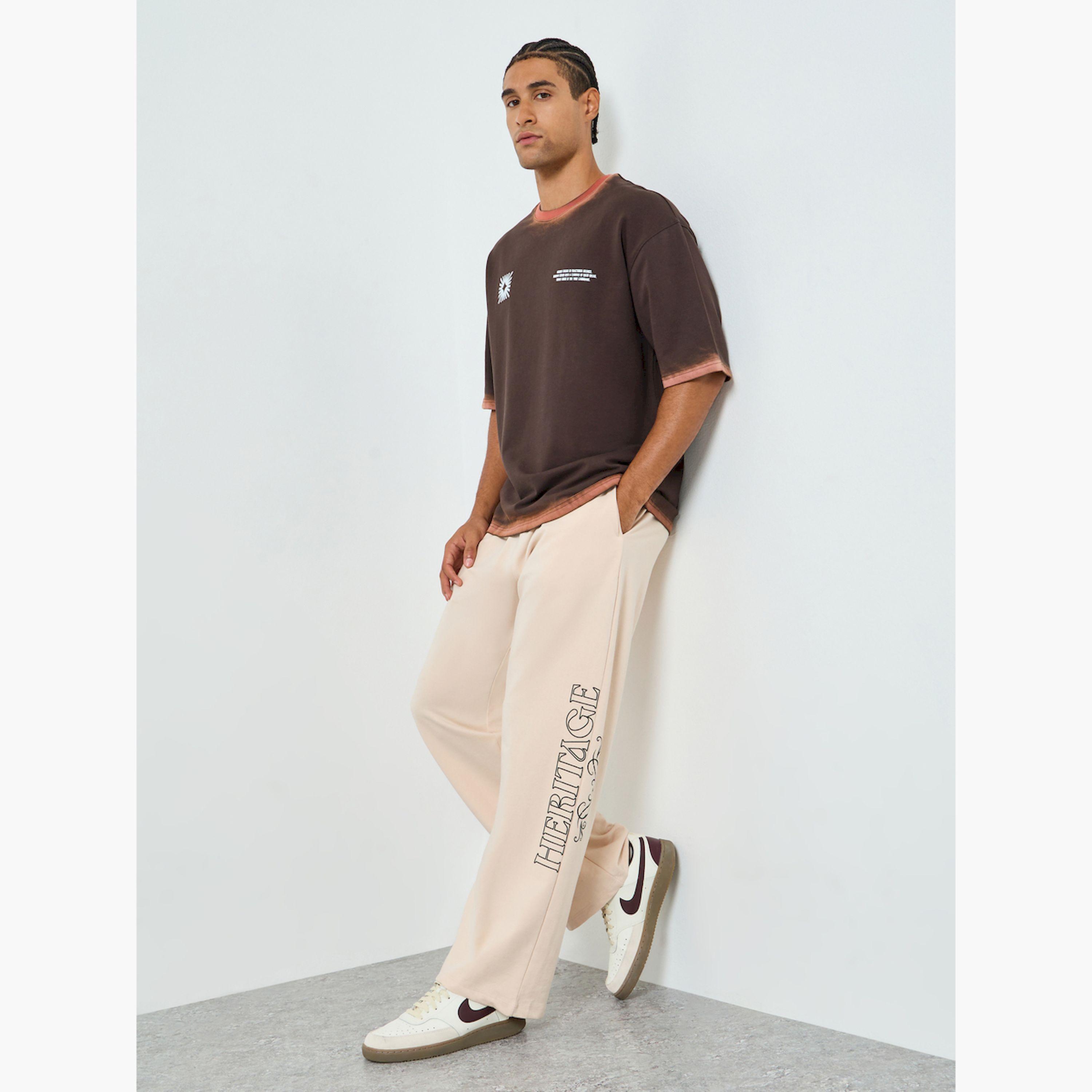 بنطال جوغر بطبعة رسومات وقصة واسعة-men-clothing-bottoms-joggers-image-2
